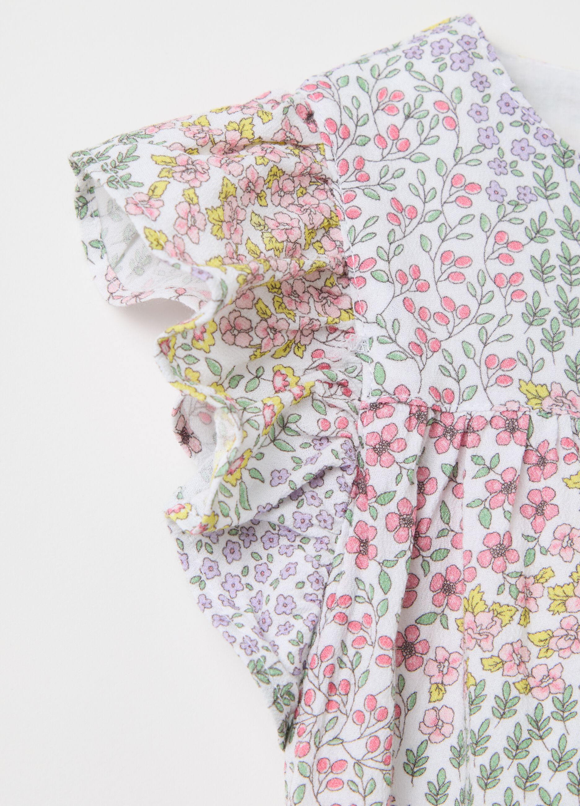 Long white dress with floral pattern