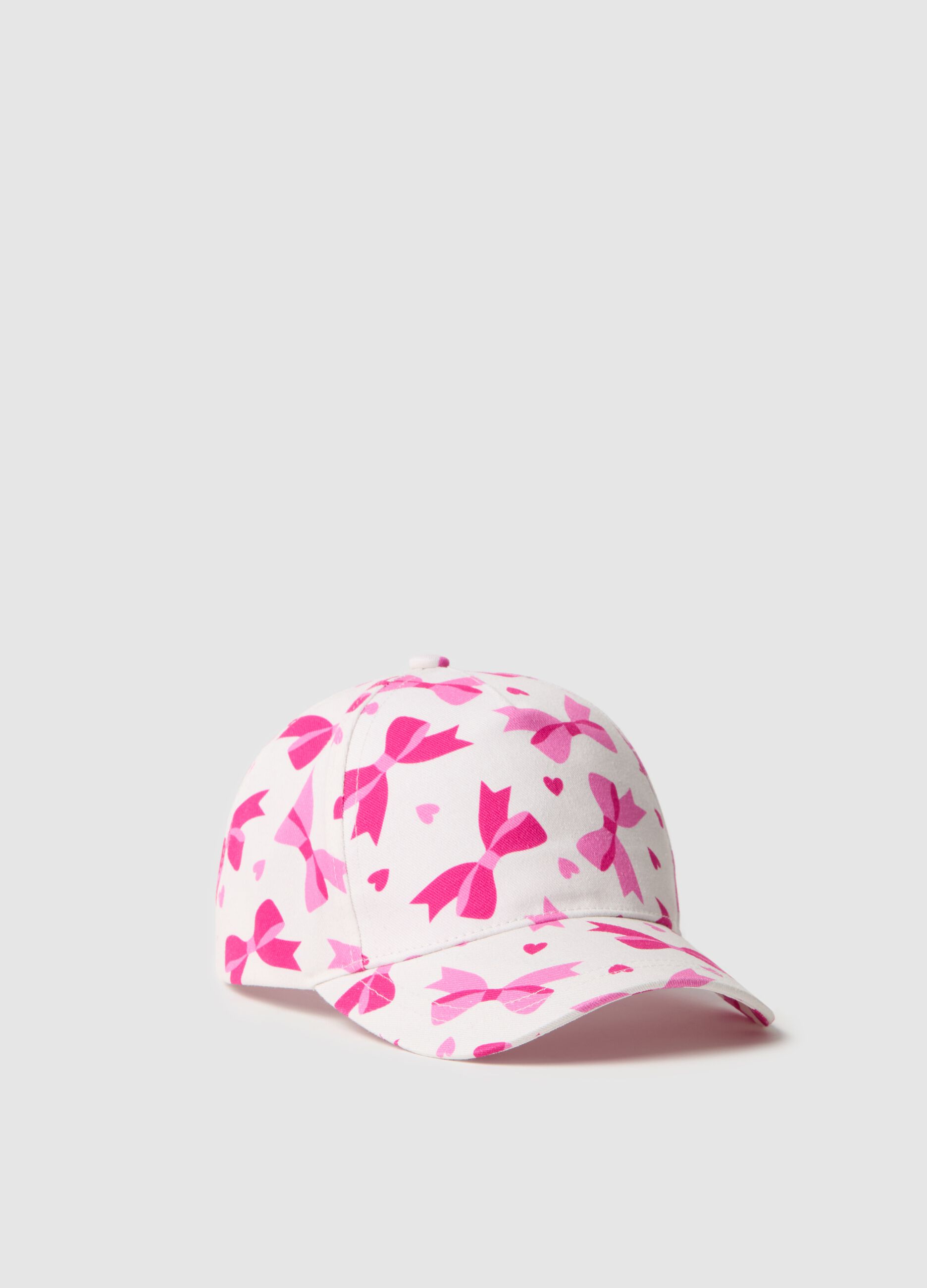 Basketball cap with bows and hearts print