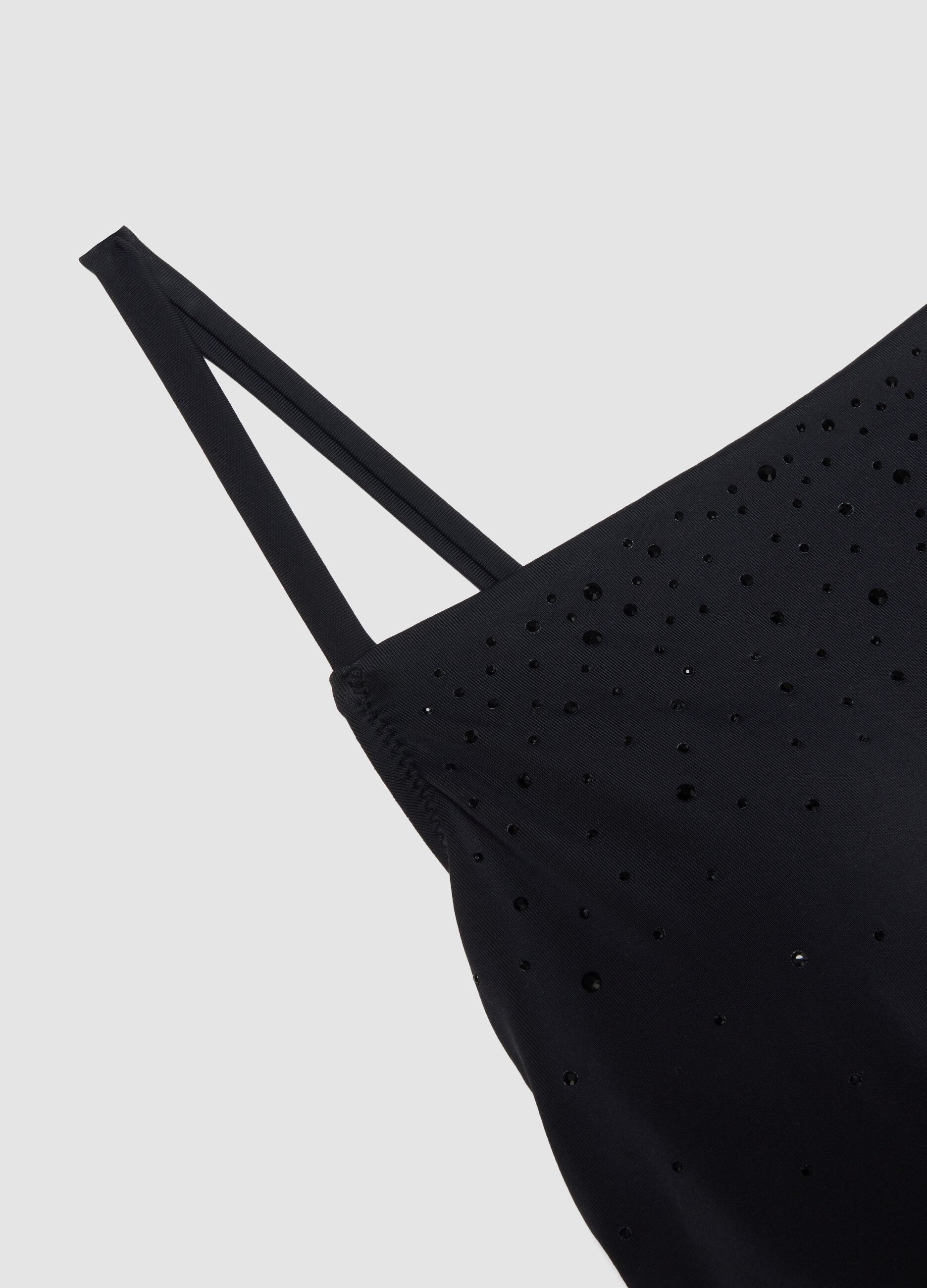 Black stretch fabric swimsuit with straps