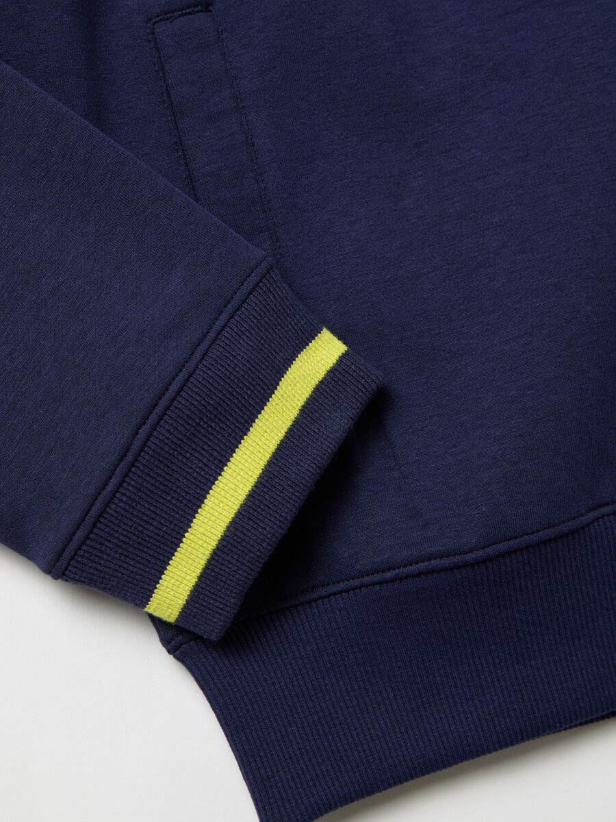 Blue full-zip sweatshirt with yellow details and logo_5