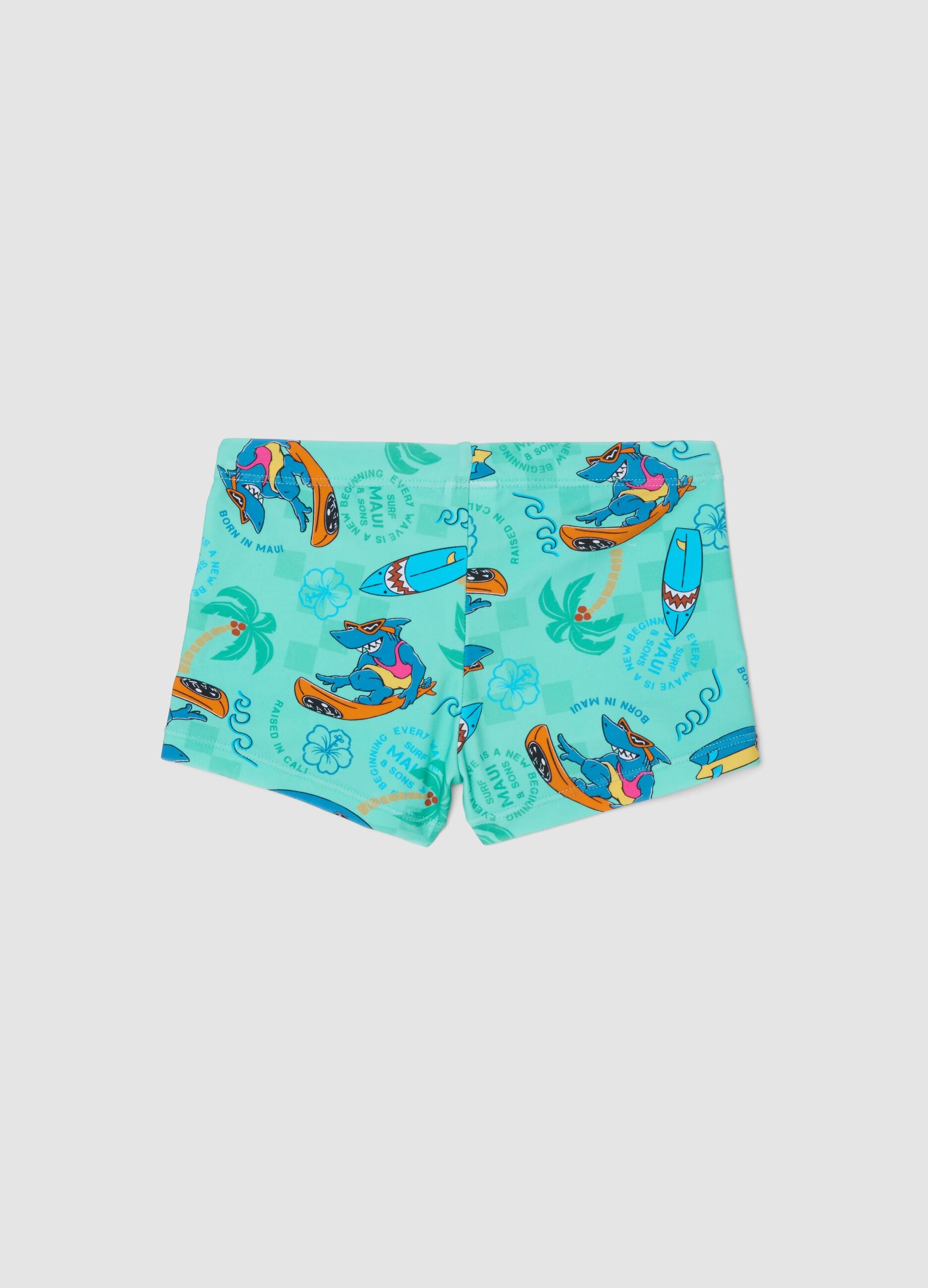 Boys&rsquo; blue stretch swim shorts with print