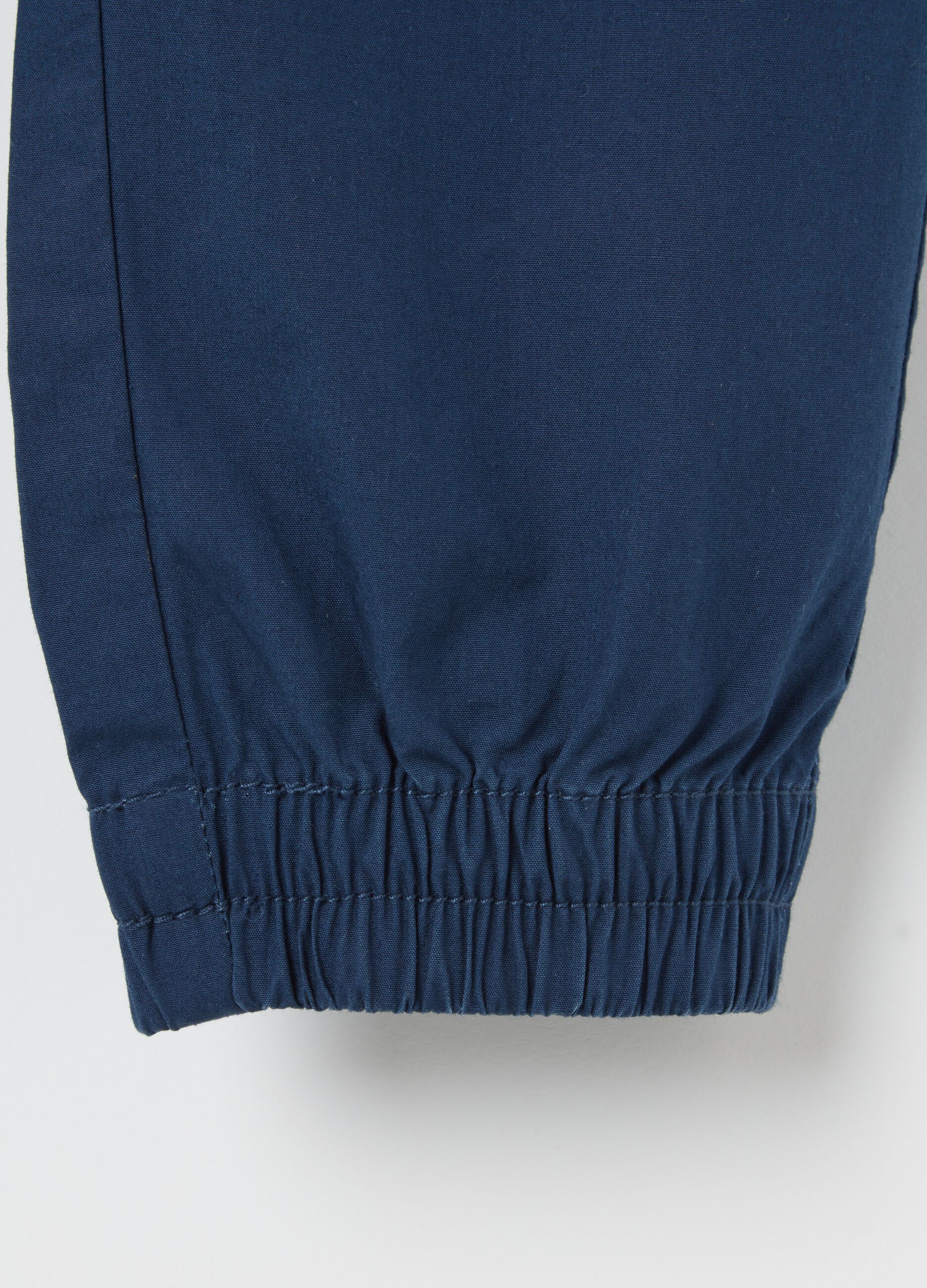 Blue trousers in cotton with drawstring
