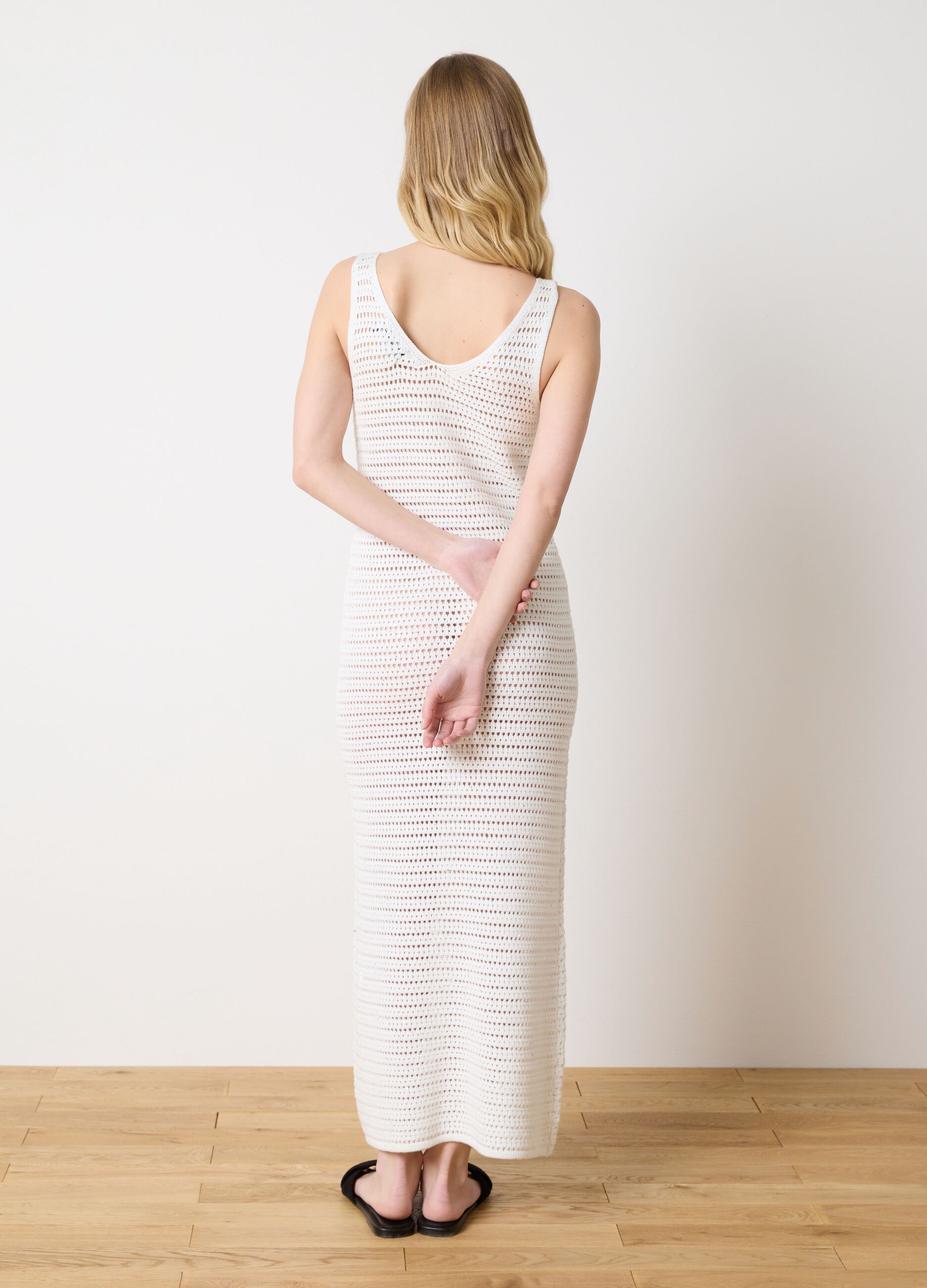 Long sleeveless crochet dress