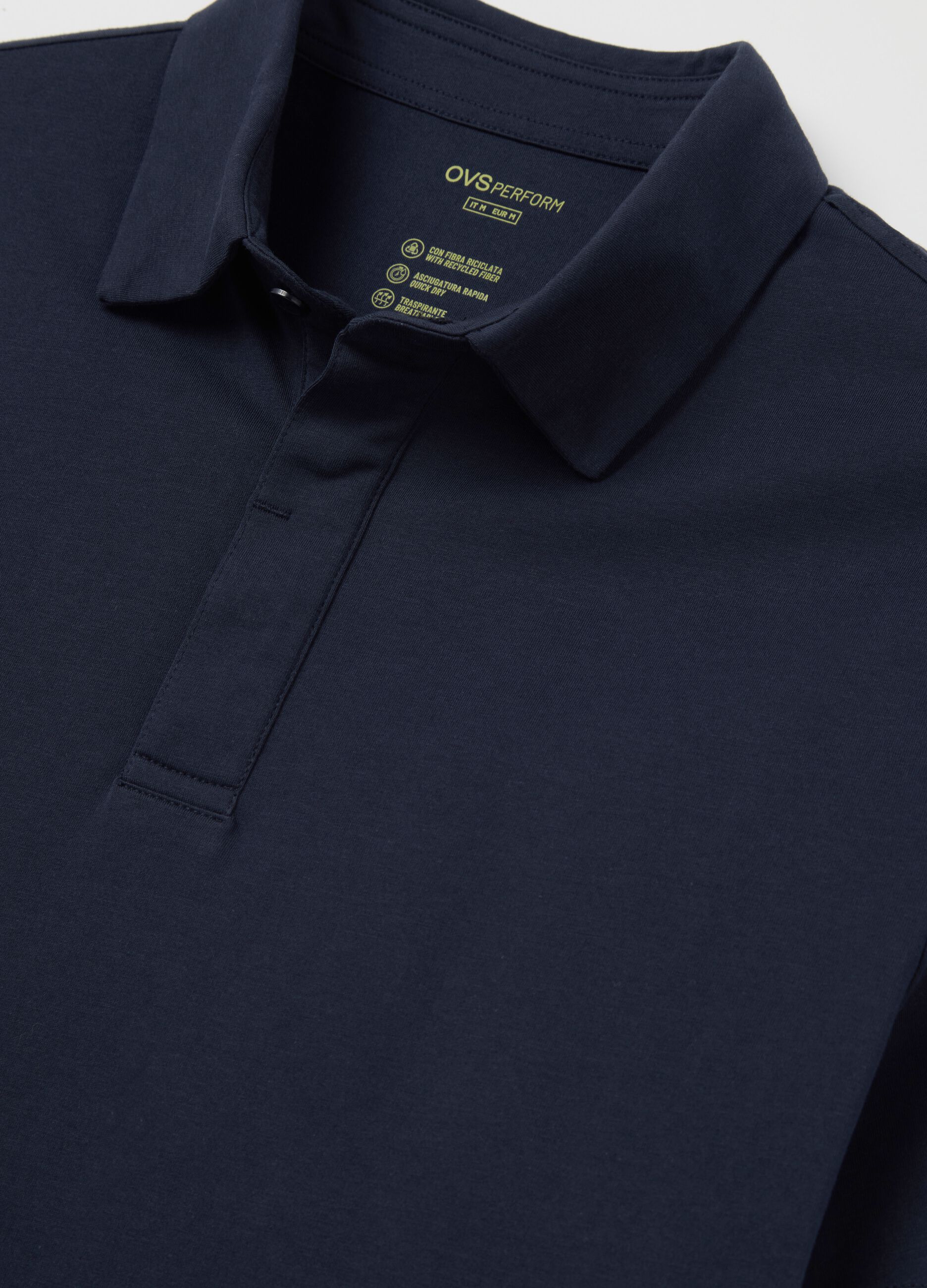 Polo blu in tessuto tecnico 