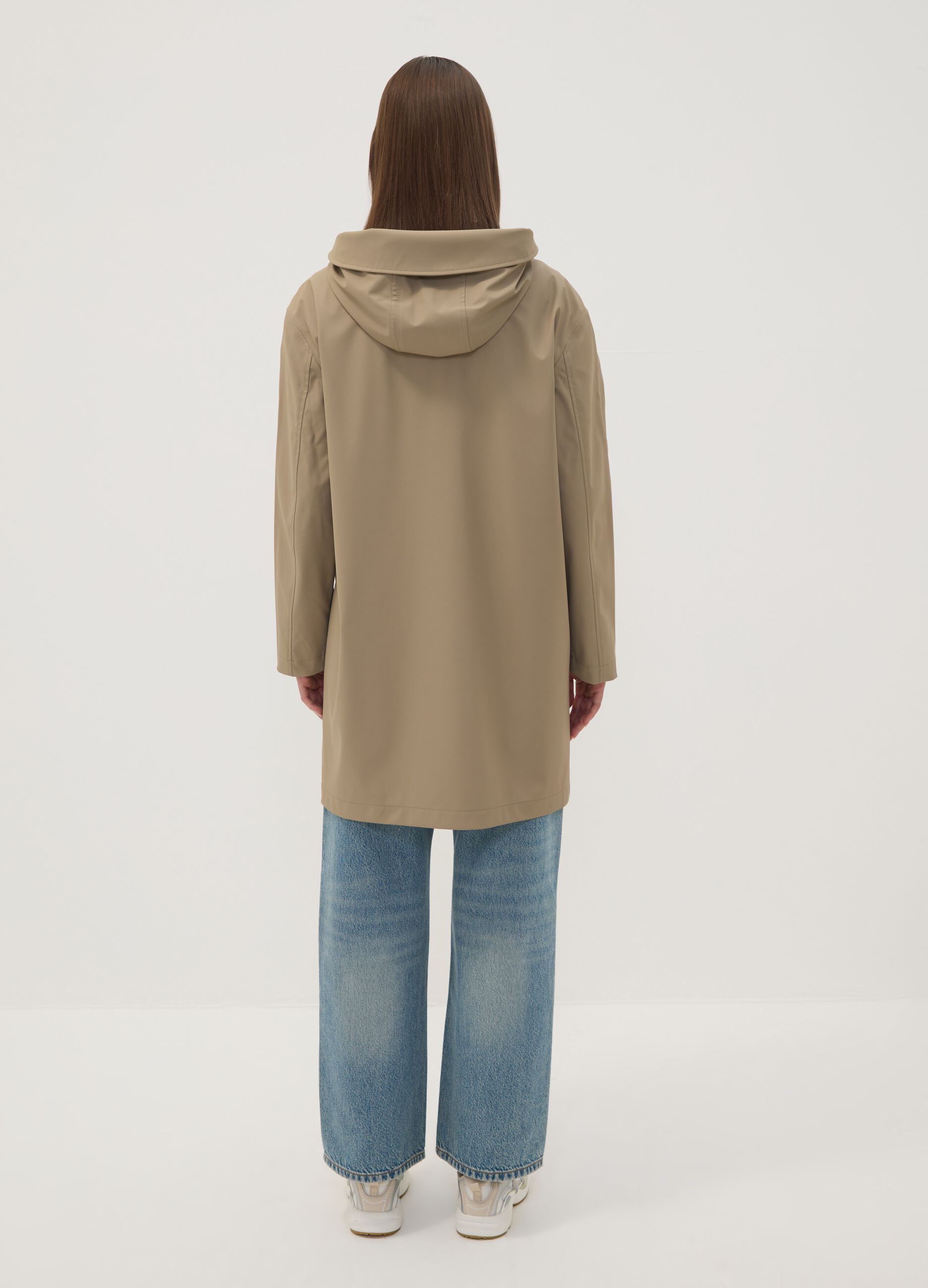 Giacca lunga beige con cappuccio e zip