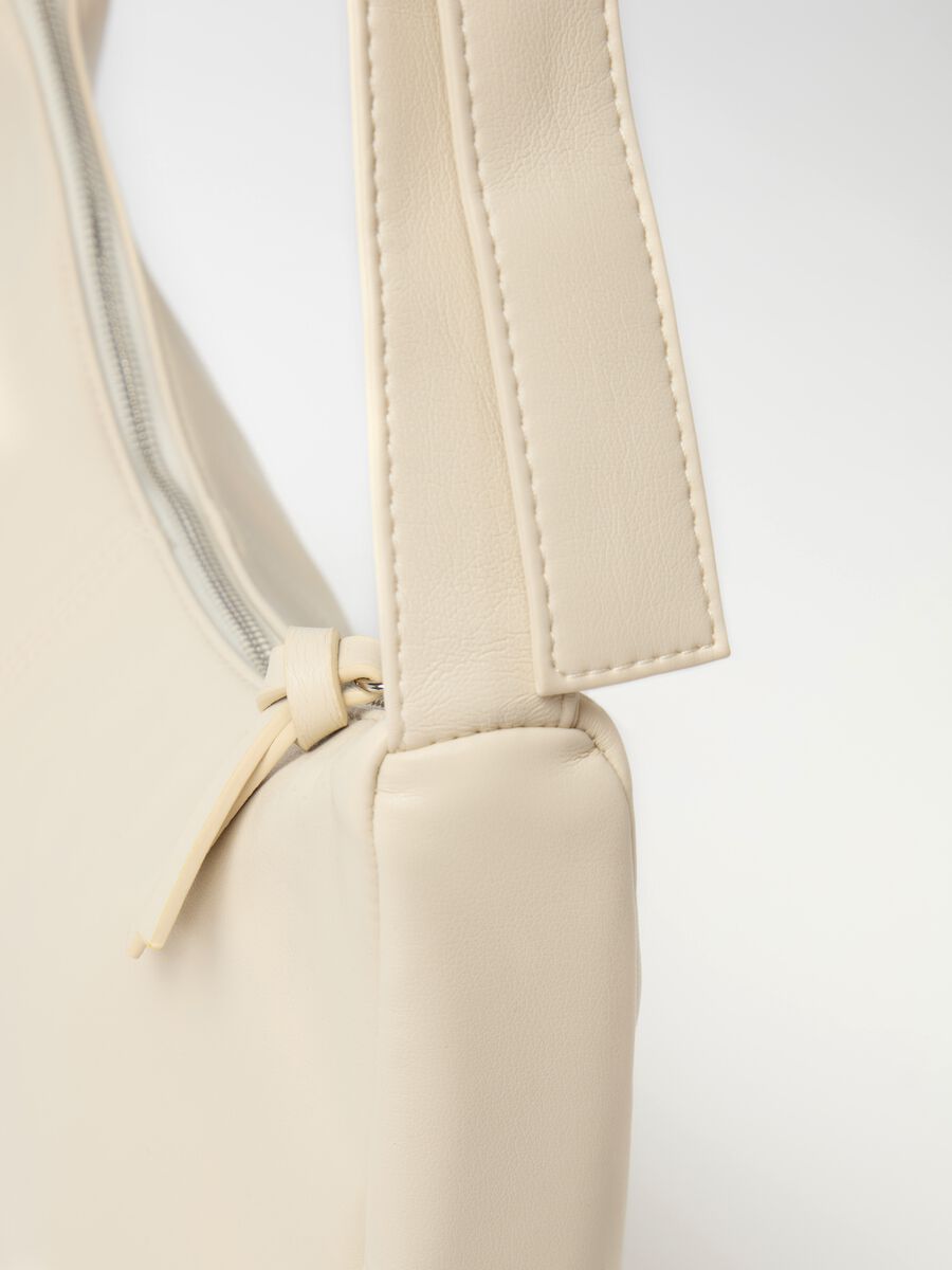 Essential half-moon bag with shoulder straps_1