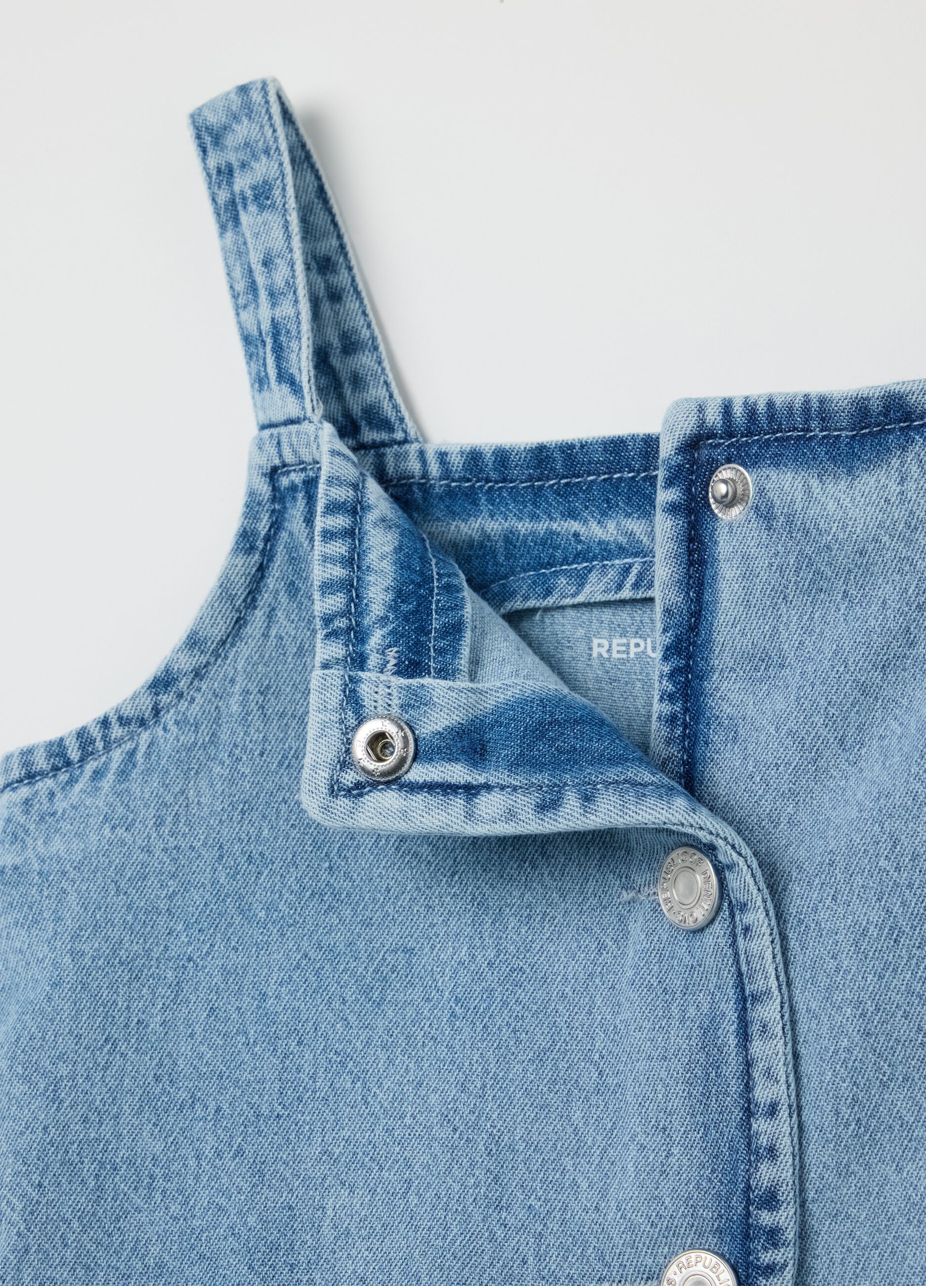 Blue chambray denim vest with flounce