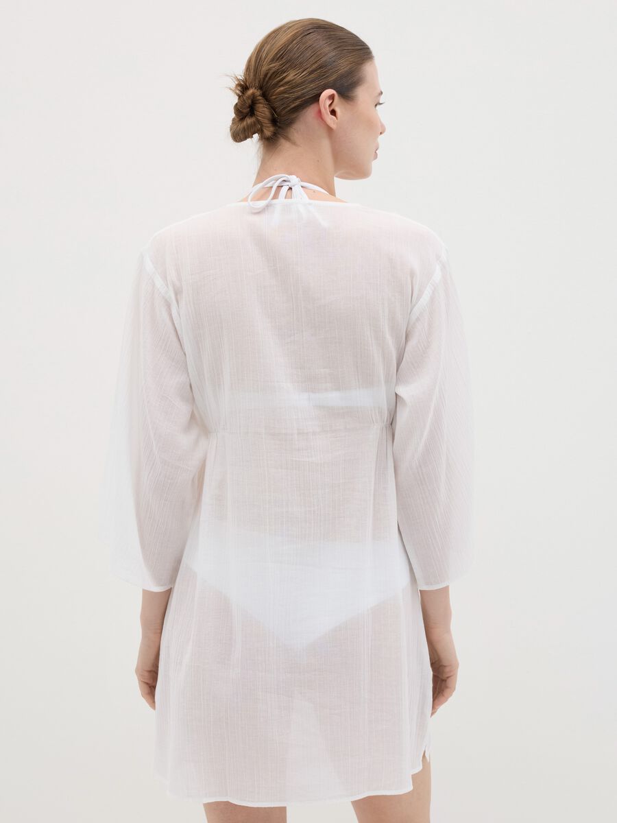 White beach cover-up with decorative edging_3