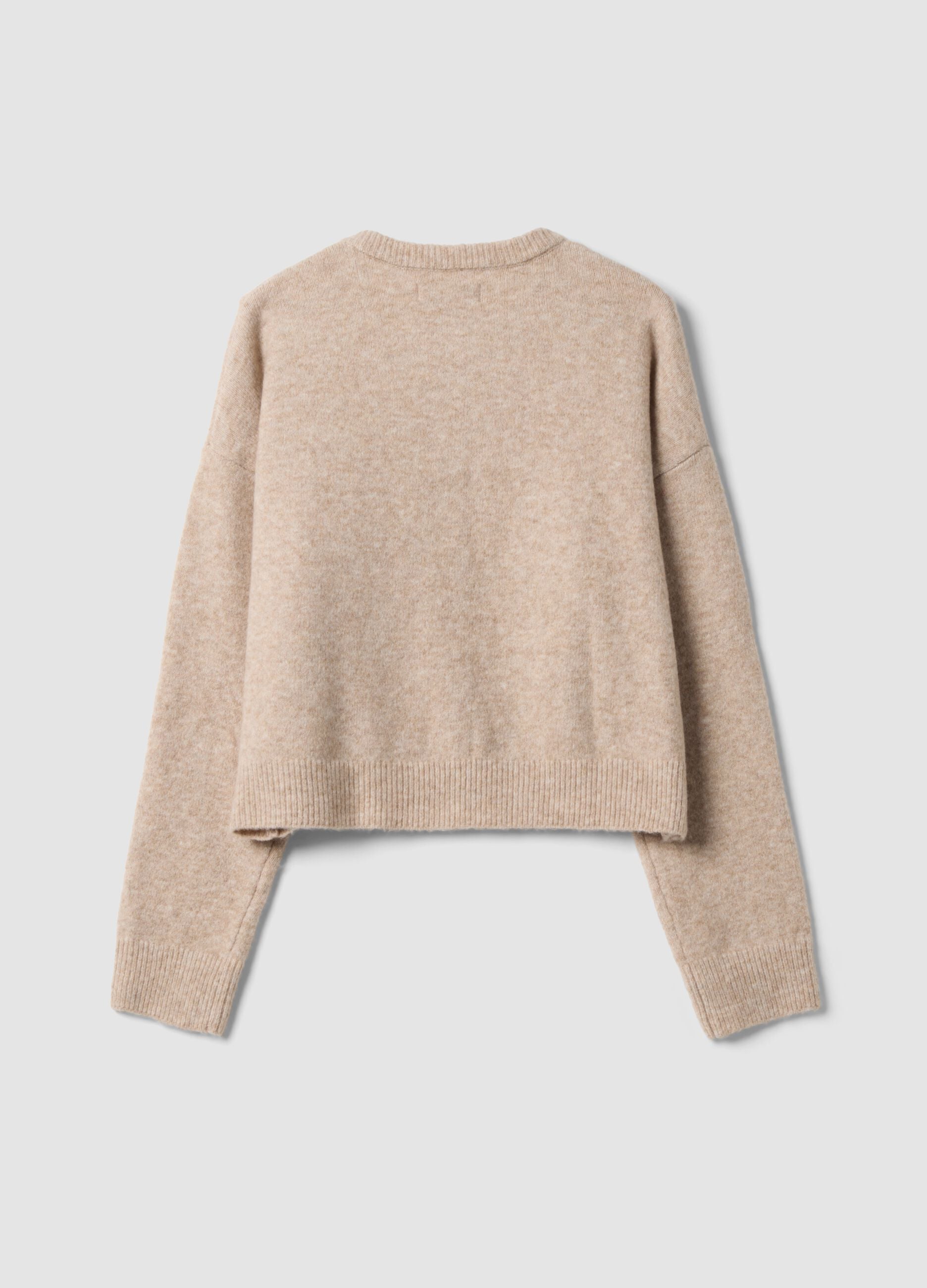 Cardigan beige in tessuto elasticizzato con girocollo over fit