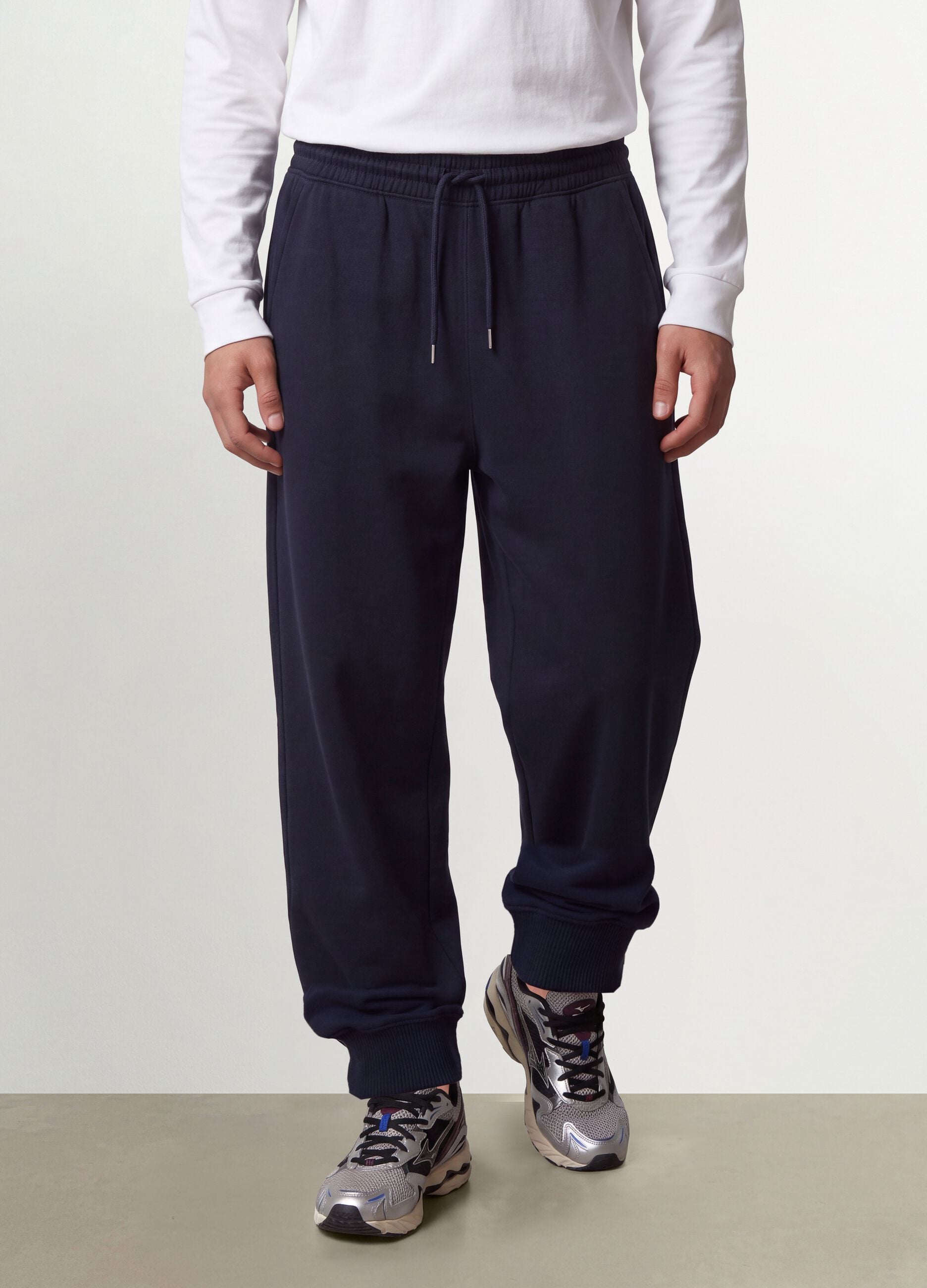 Blue cotton-blend joggers with cuffed hem and drawstring