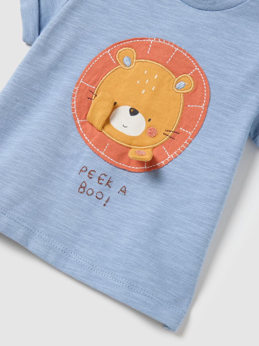 Short sleeve blue T-shirt with Peek-a-boo print_2