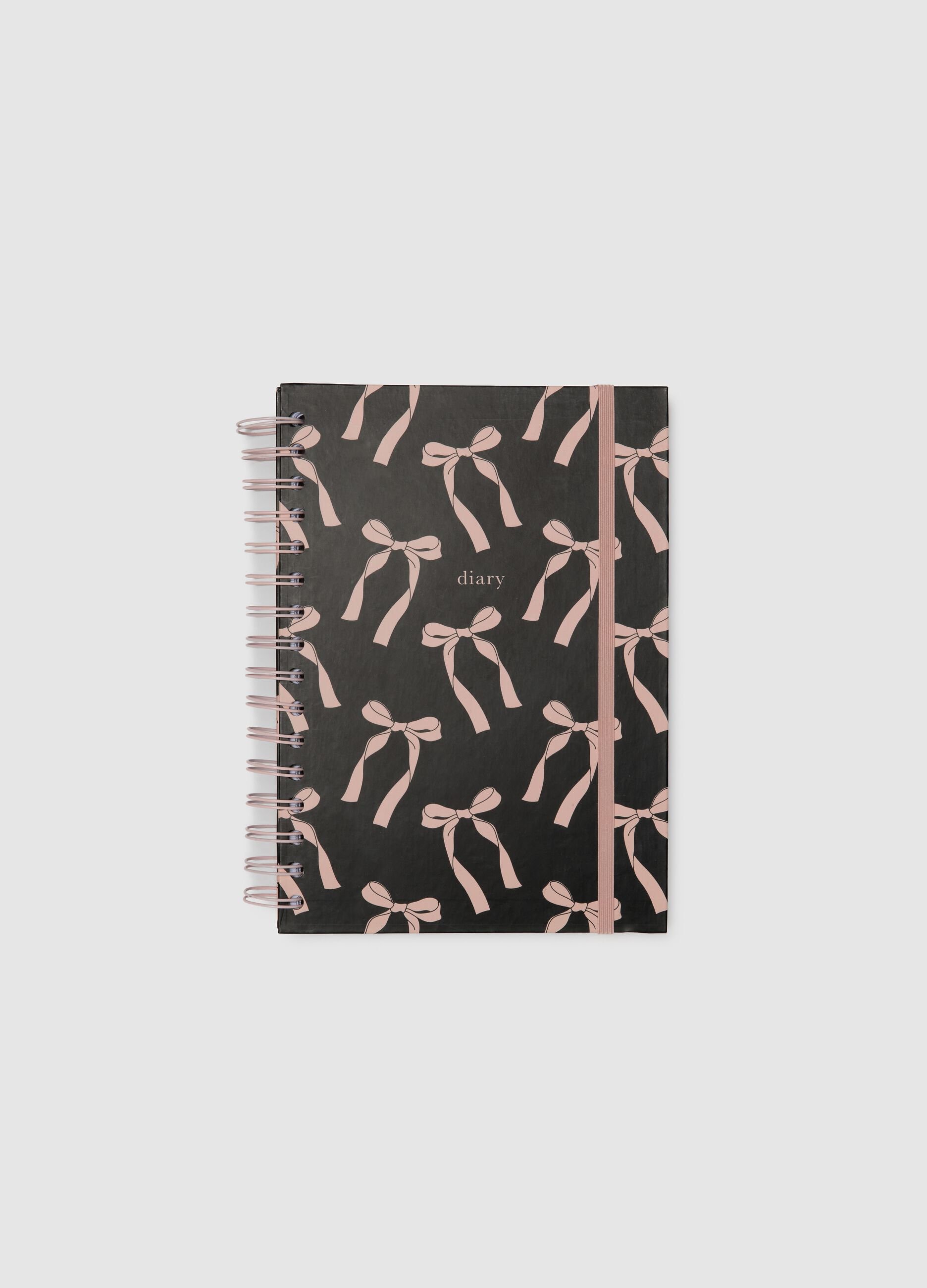 Quaderno in carta multicolor con fiocchi