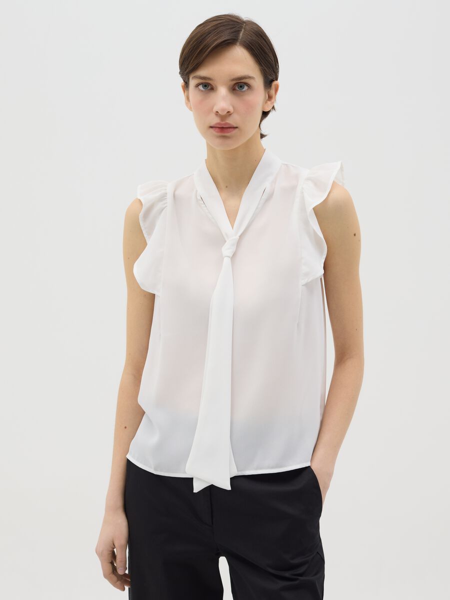 White sleeveless blouse with flounce_0