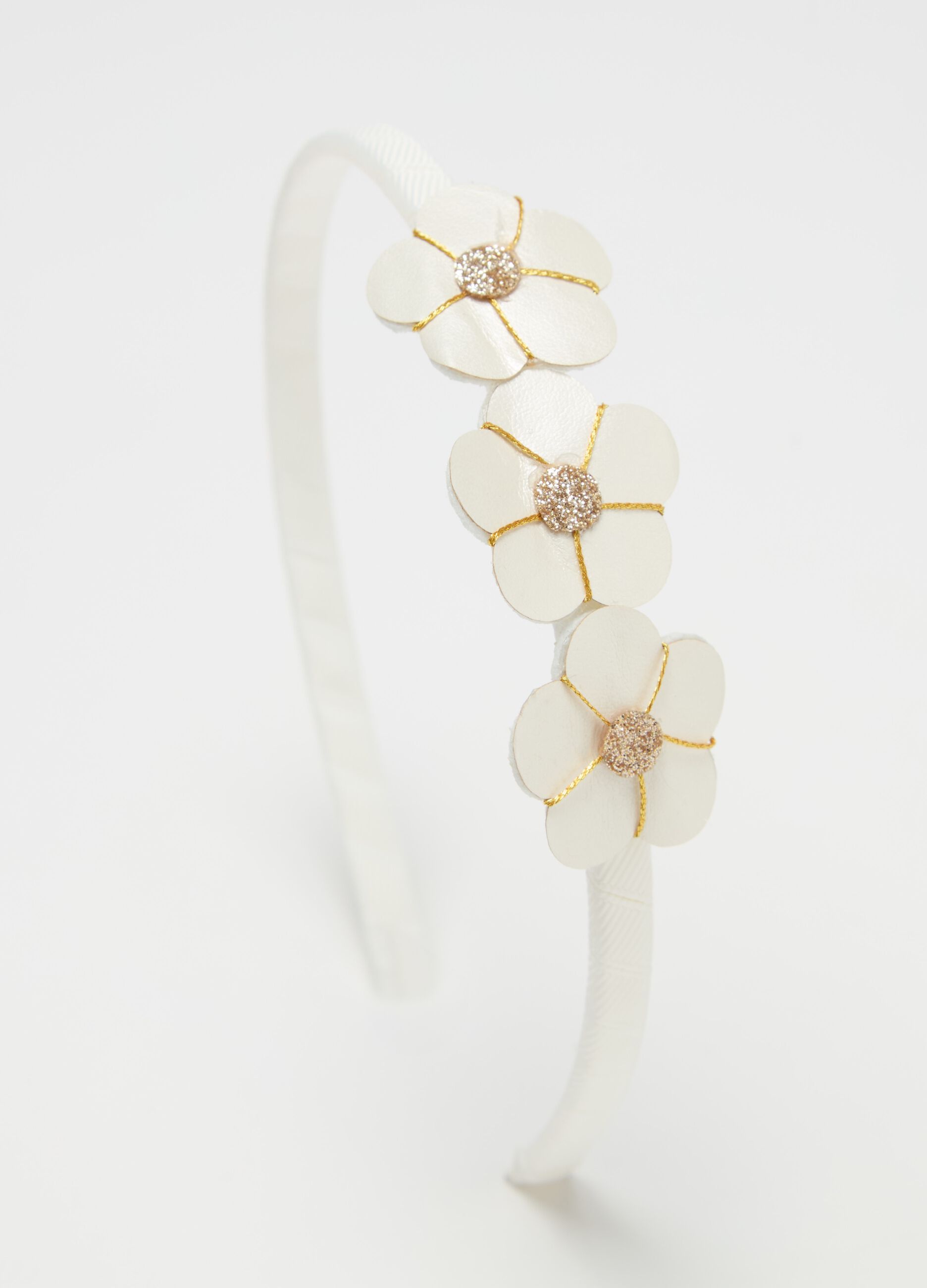 Alice band with appliqué flowers