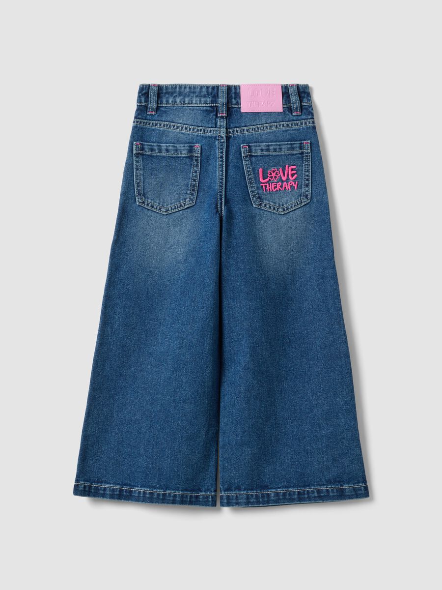 Jeans blu wide leg in puro cotone con stampa floreale per bambina_1