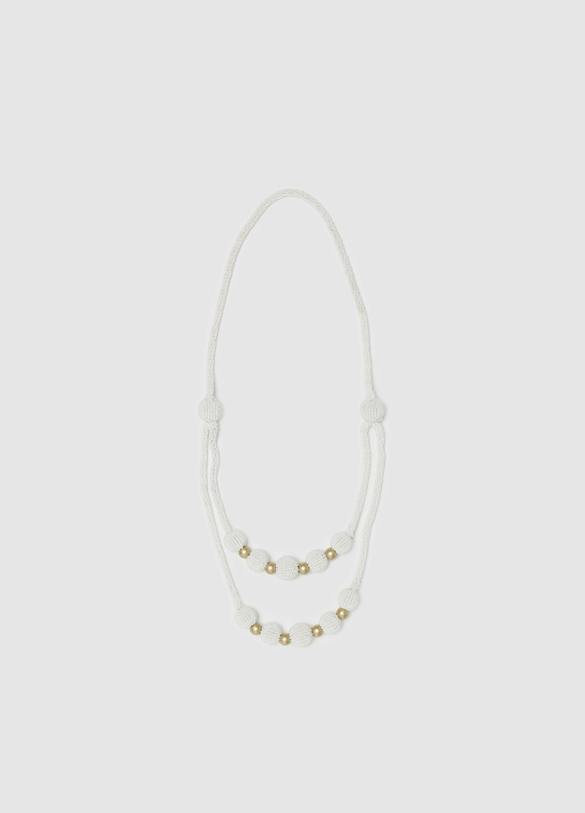 Beaded necklace with gold details