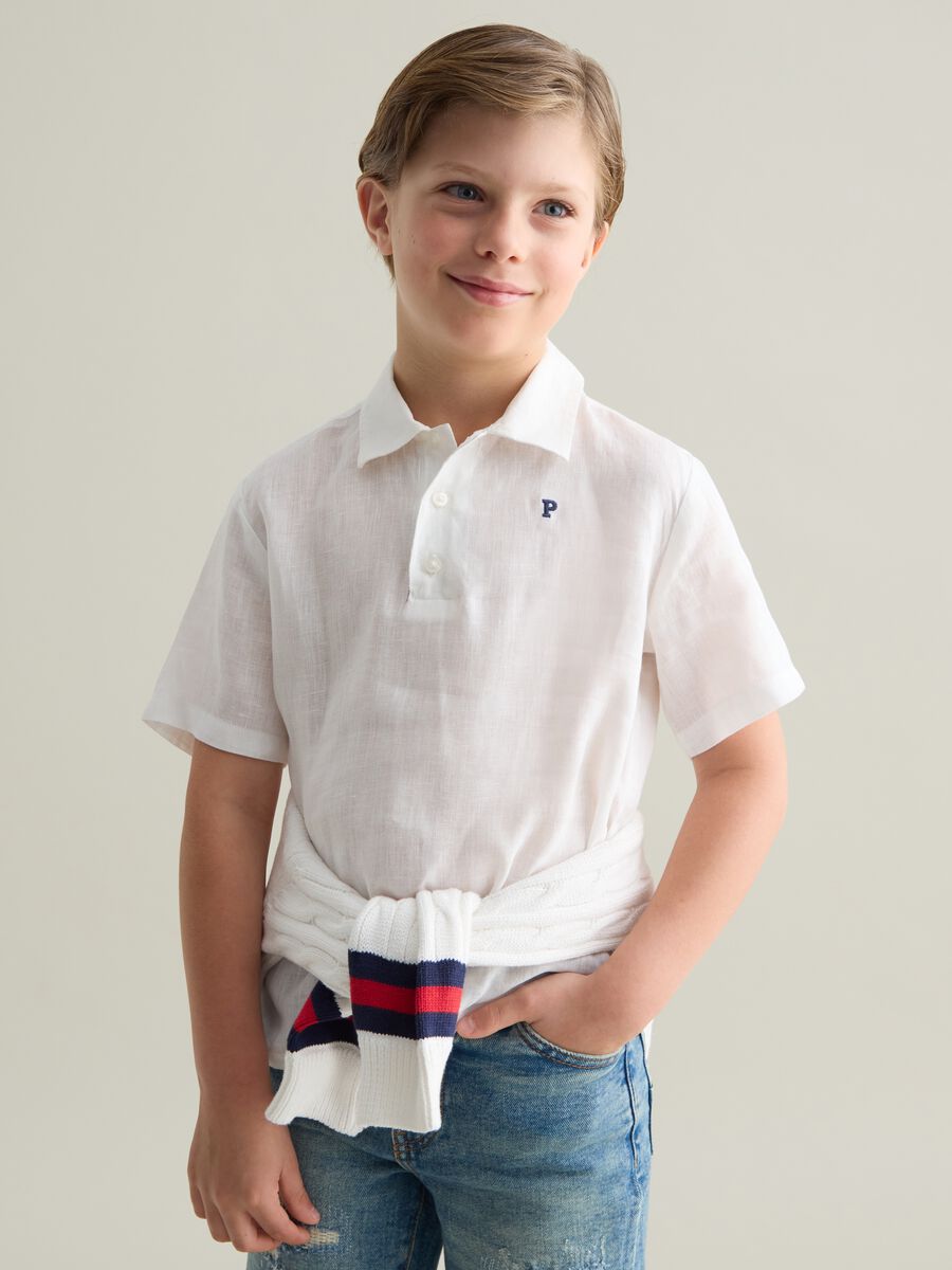 White linen kids' polo with an oversized fit and buttons_0