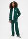 Green knitted trousers for children_0