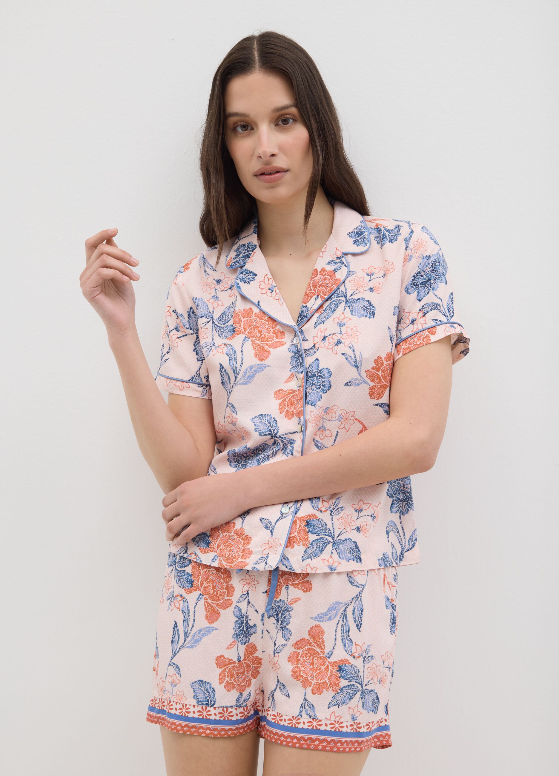Short orange pyjamas with floral print