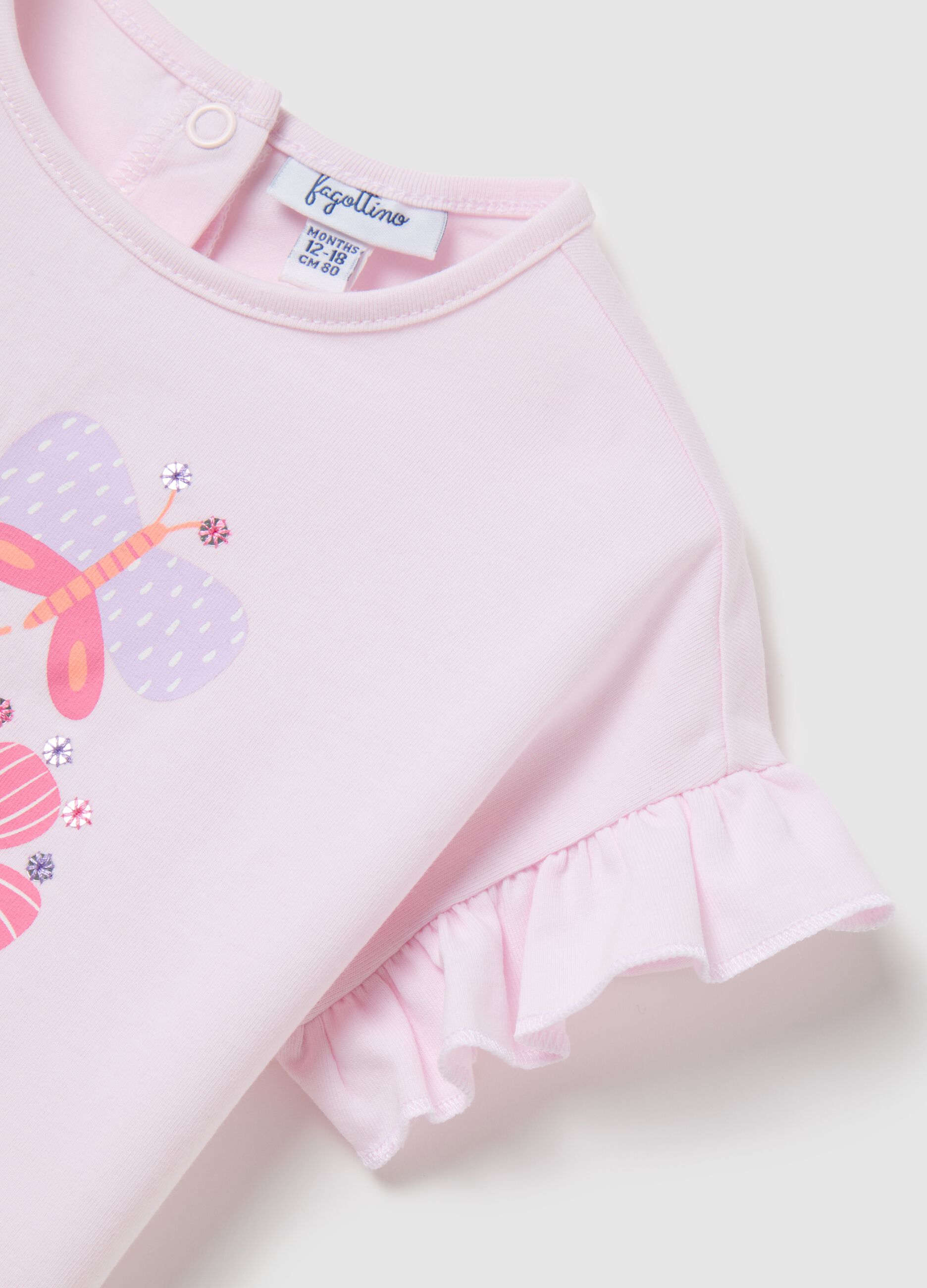 Pink T-shirt with ruffles and floral print