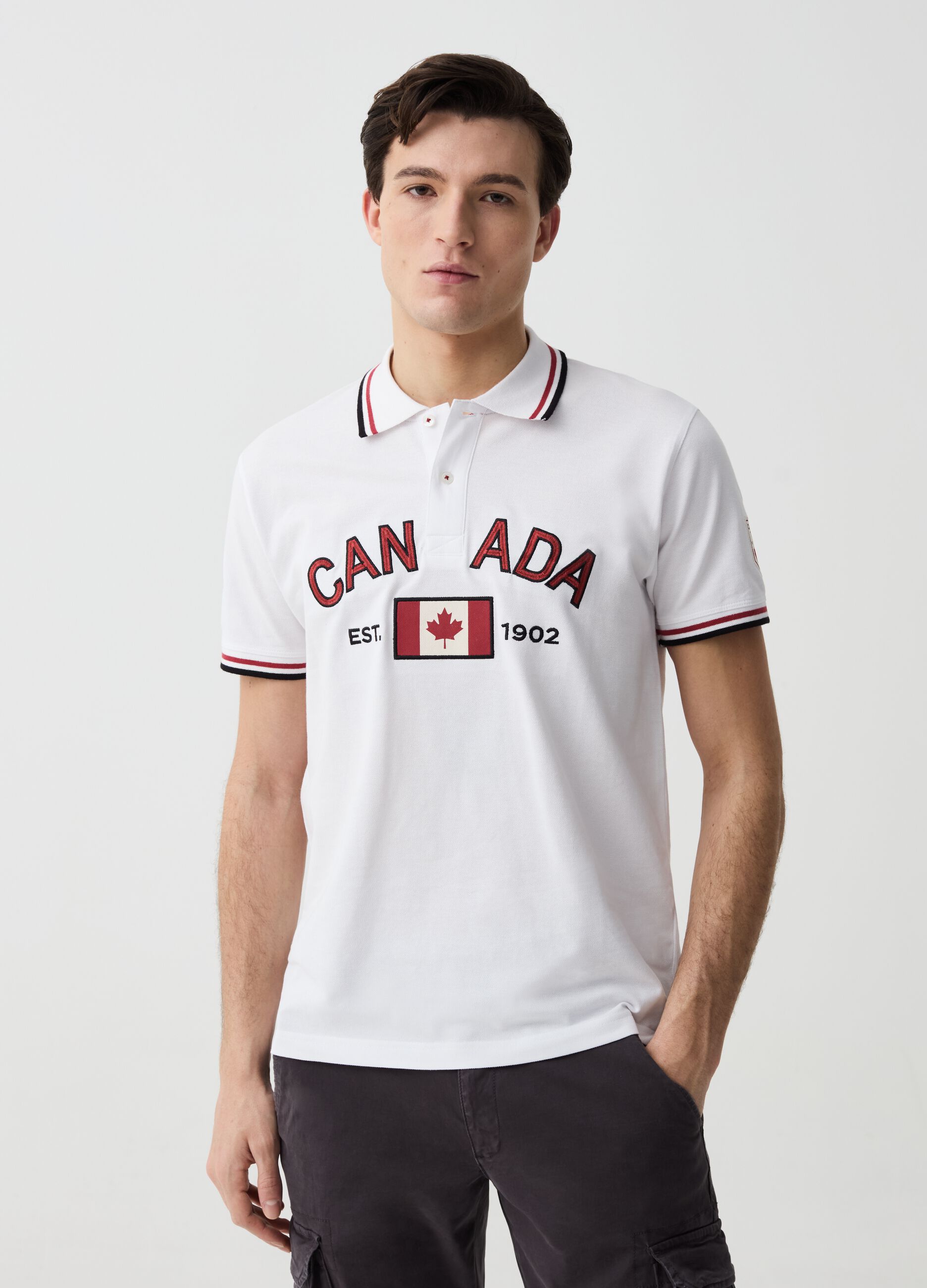 Polo shirt with striped edging and Canada Trail embroidery