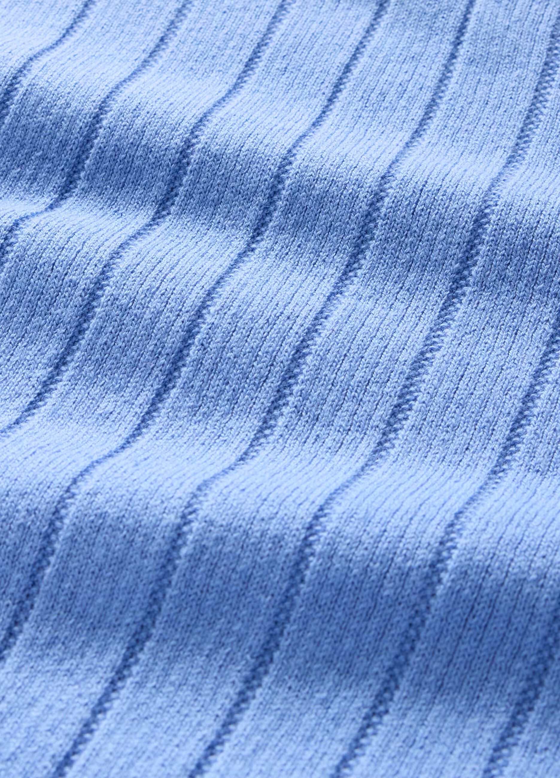 Light blue polo shirt with short sleeves in cotton