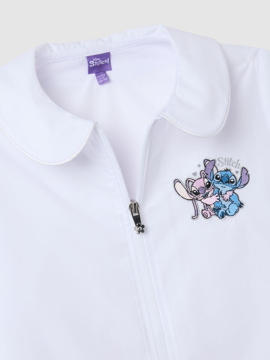 Girls' school smock in white cotton blend with Stitch embroidery_2