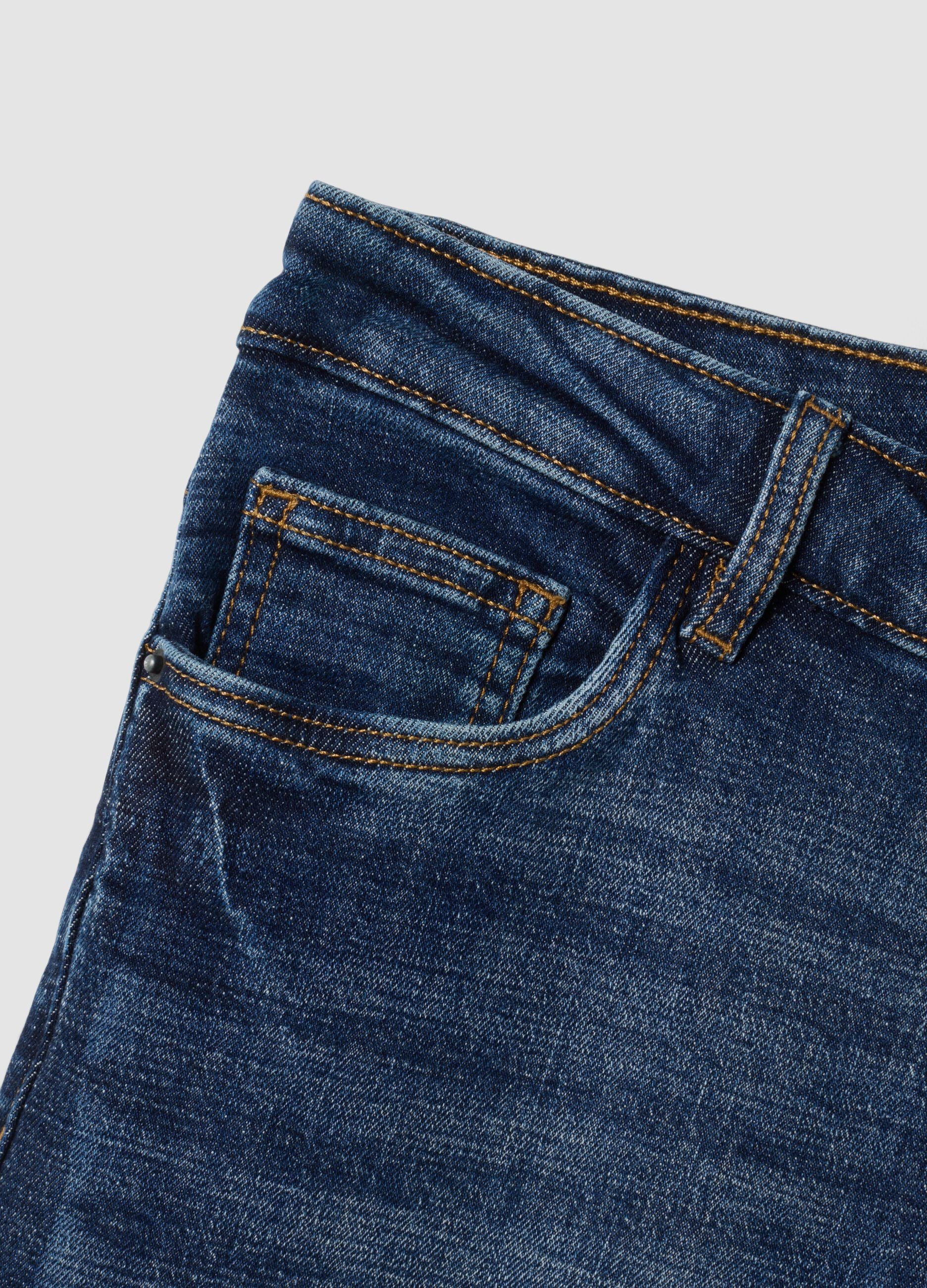 Blue bootcut denim jeans in stretch cotton