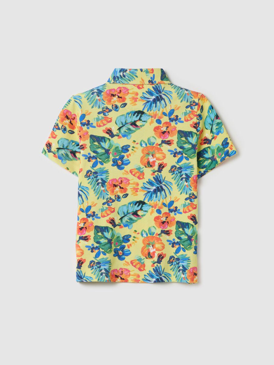 Yellow polo shirt in cotton with tropical pattern_1