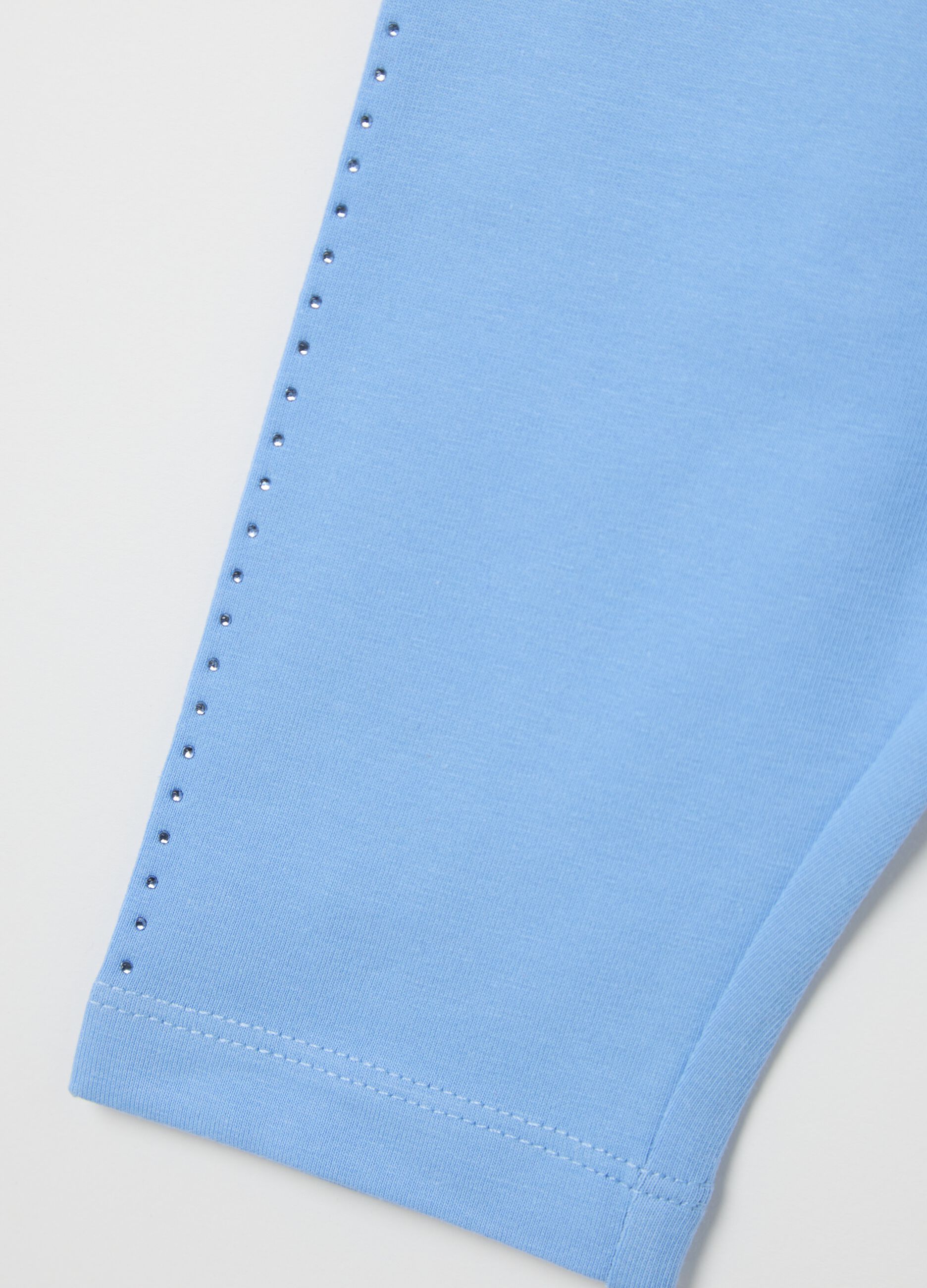 Light blue three-quarter stretch leggings with diamantés