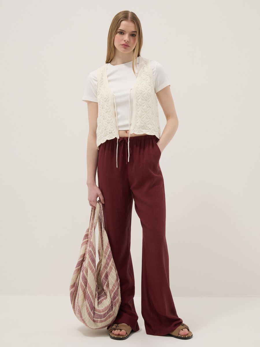 White pure cotton regular-fit waistcoat with tie fastening and deep V-neck_1