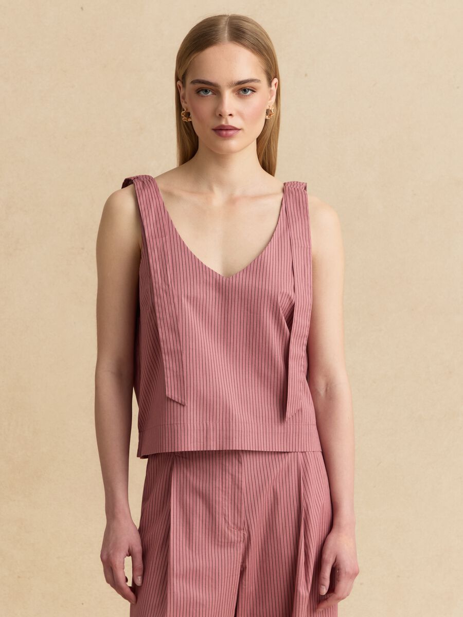 Blusa rosa in cotone elasticizzato con spalline annodate_1