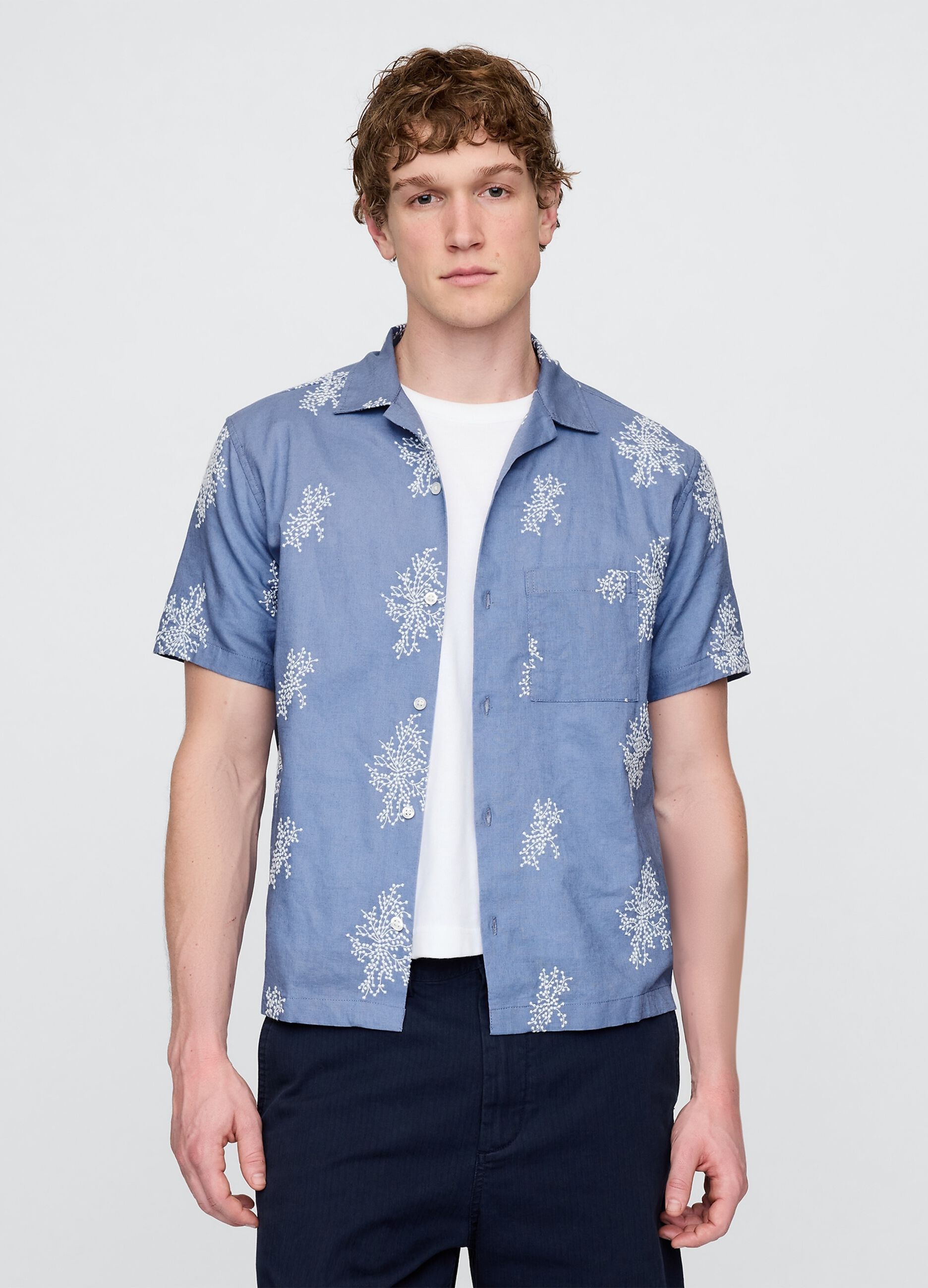Light blue short sleeve shirt with floral print