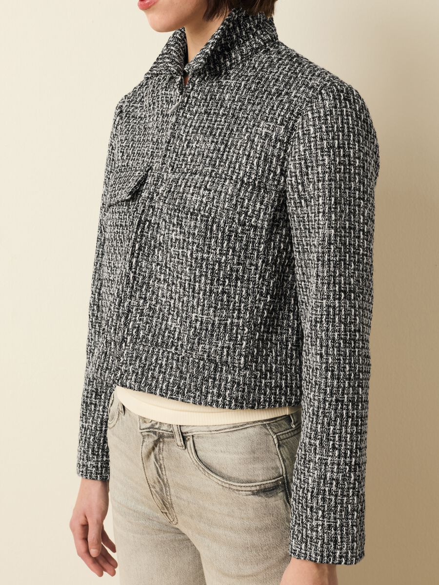 Short jacket in tweed with geometric weave_0