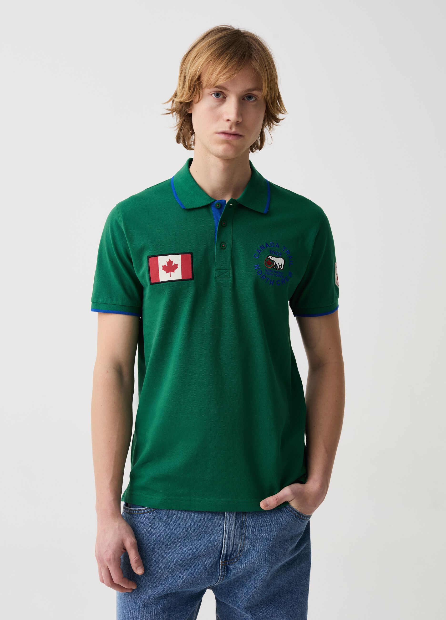 Polo shirt with striped edging and logo embroidery