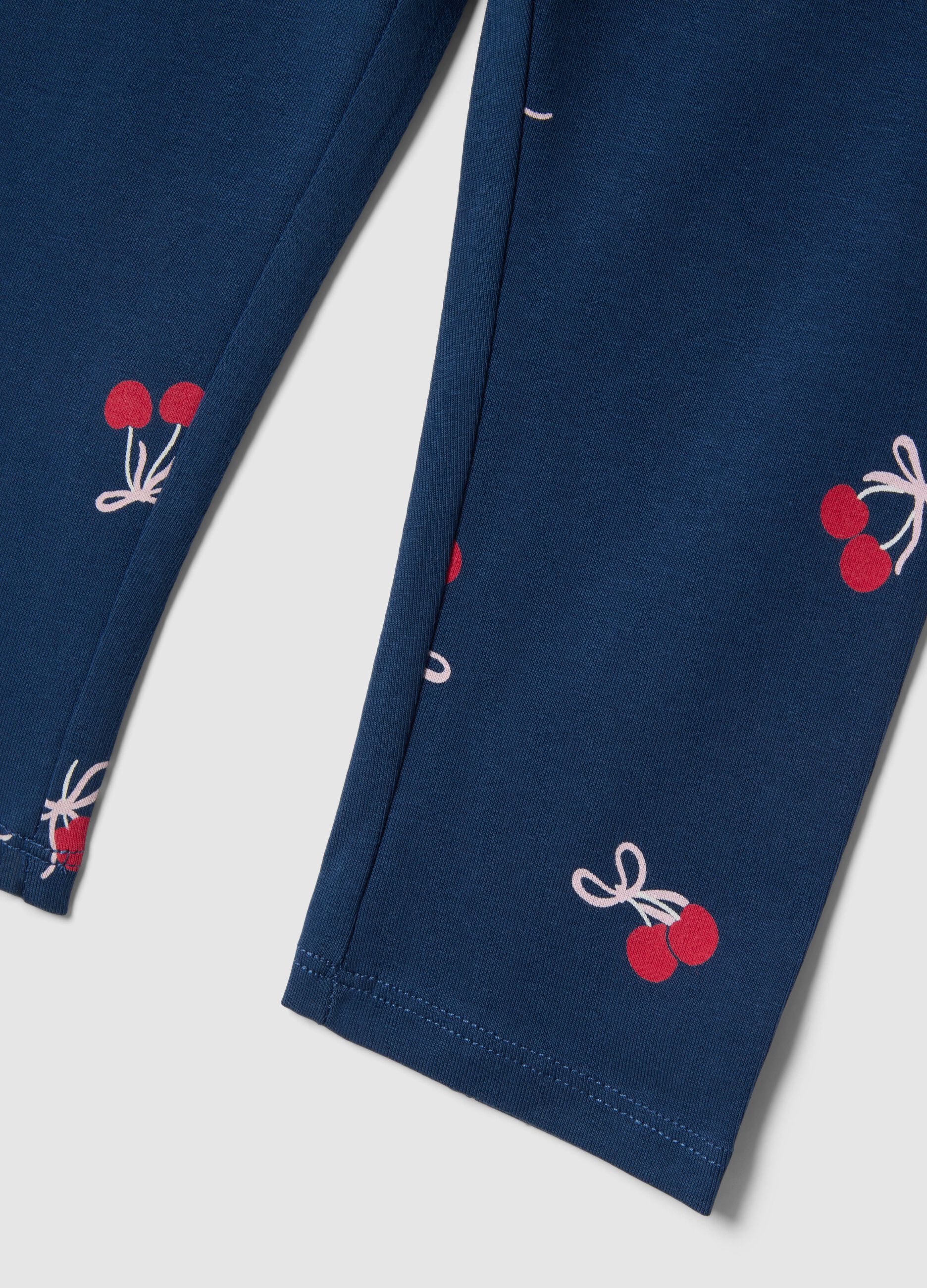 Girl's slim-fit blue stretch cotton leggings with patterns