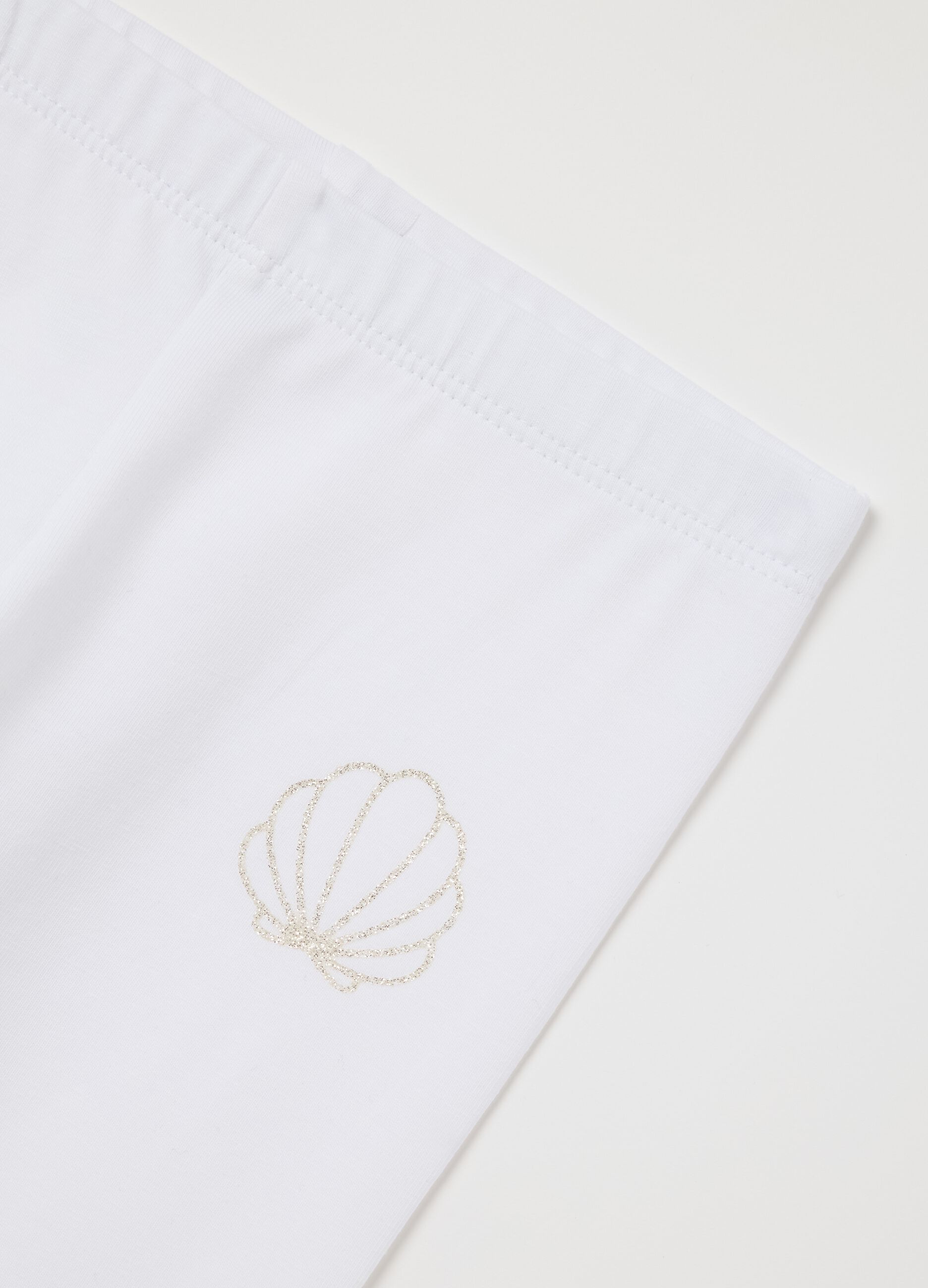 White leggings with glitter shell