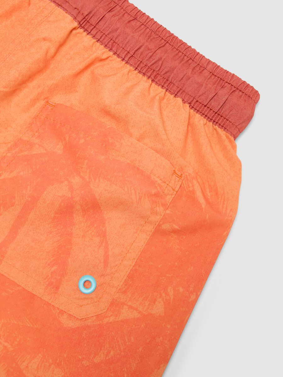 Orange boys&rsquo; swim shorts with tropical print_3