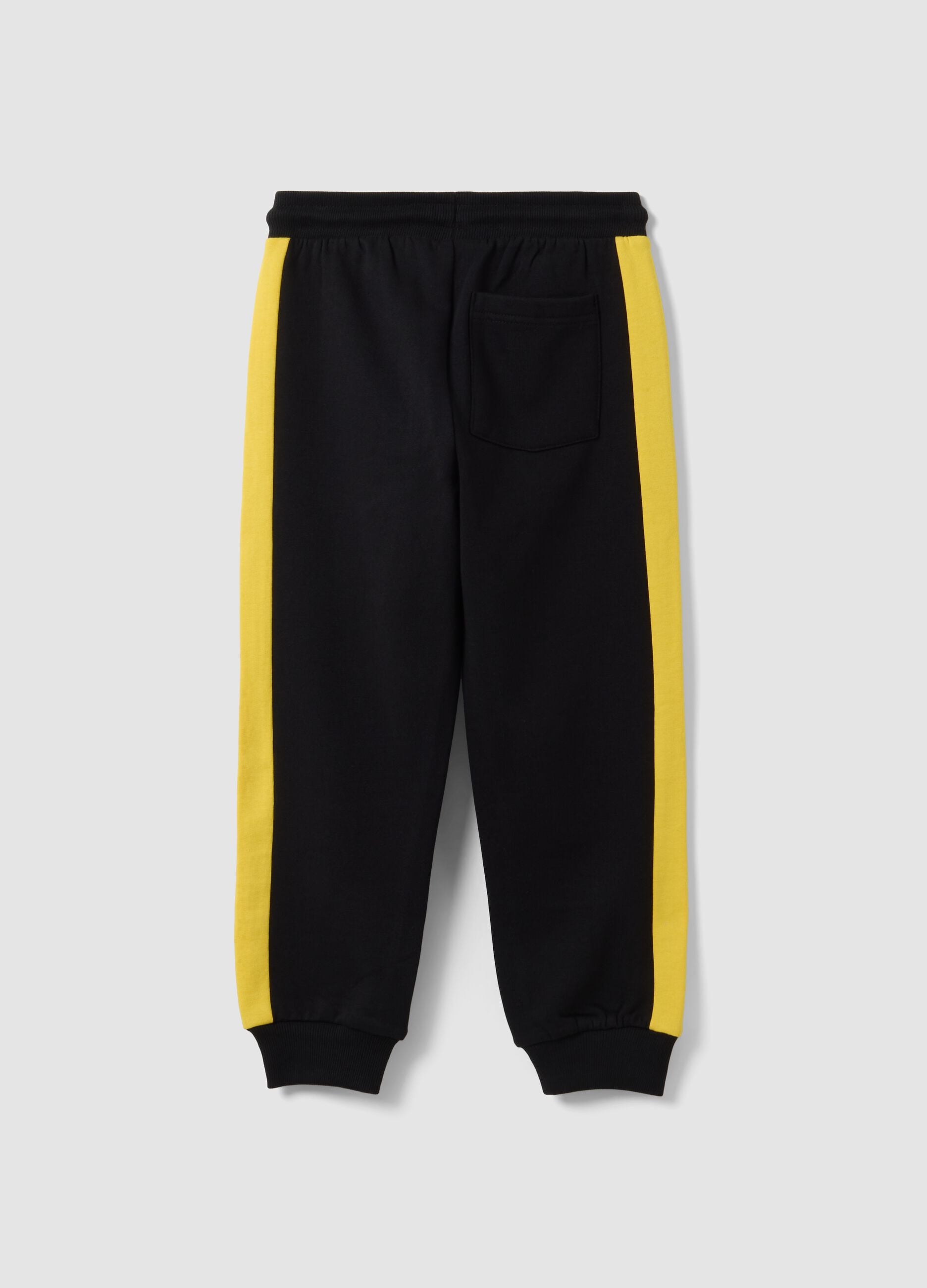 Black 100% cotton kids&rsquo; tracksuit bottoms with yellow side stripes