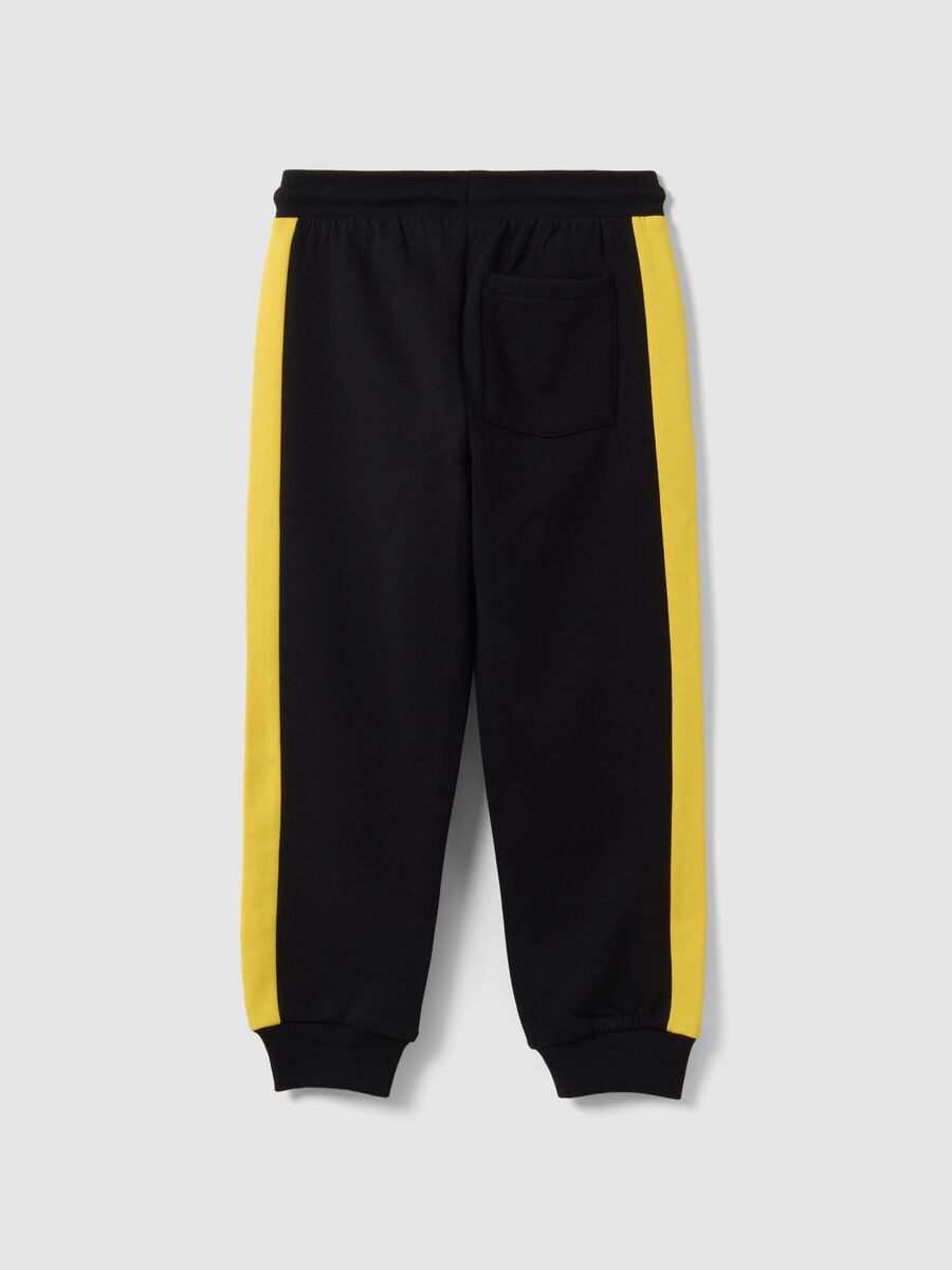 Pantaloni sportivi neri in puro cotone con bande gialle per bambino_1