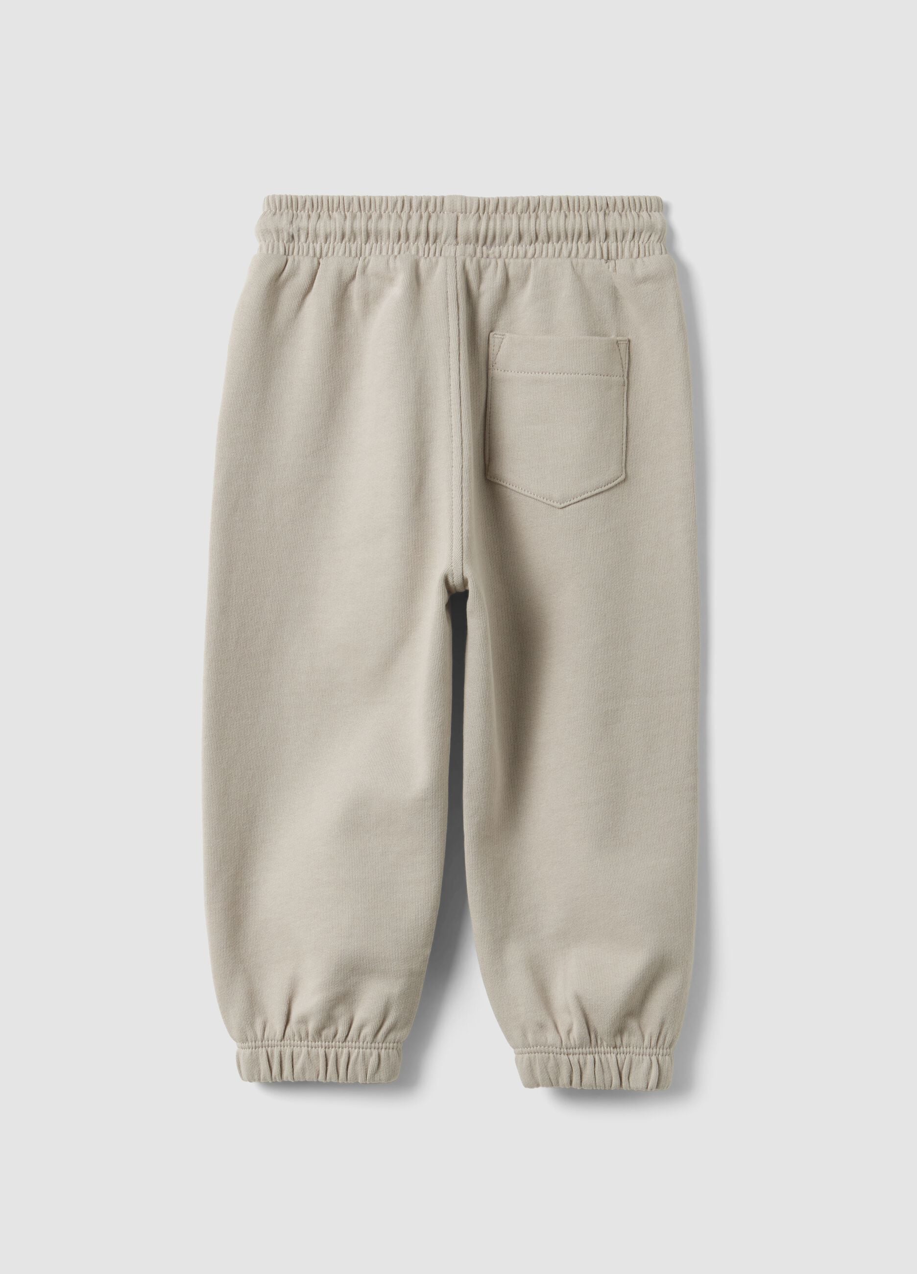 Grey jogger trousers in pure organic cotton with drawstring for baby boy