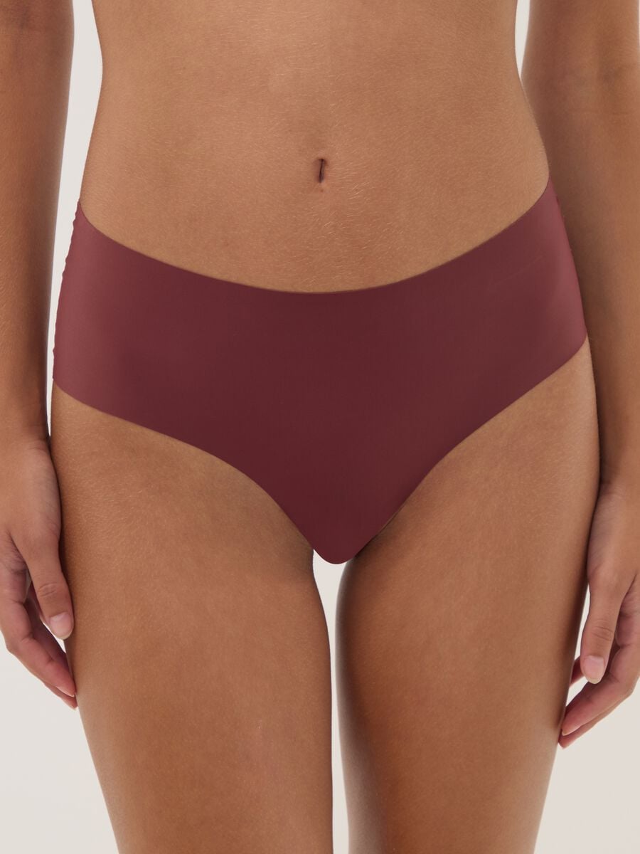 Slip rosso in tessuto elasticizzato con inserti floreali_1