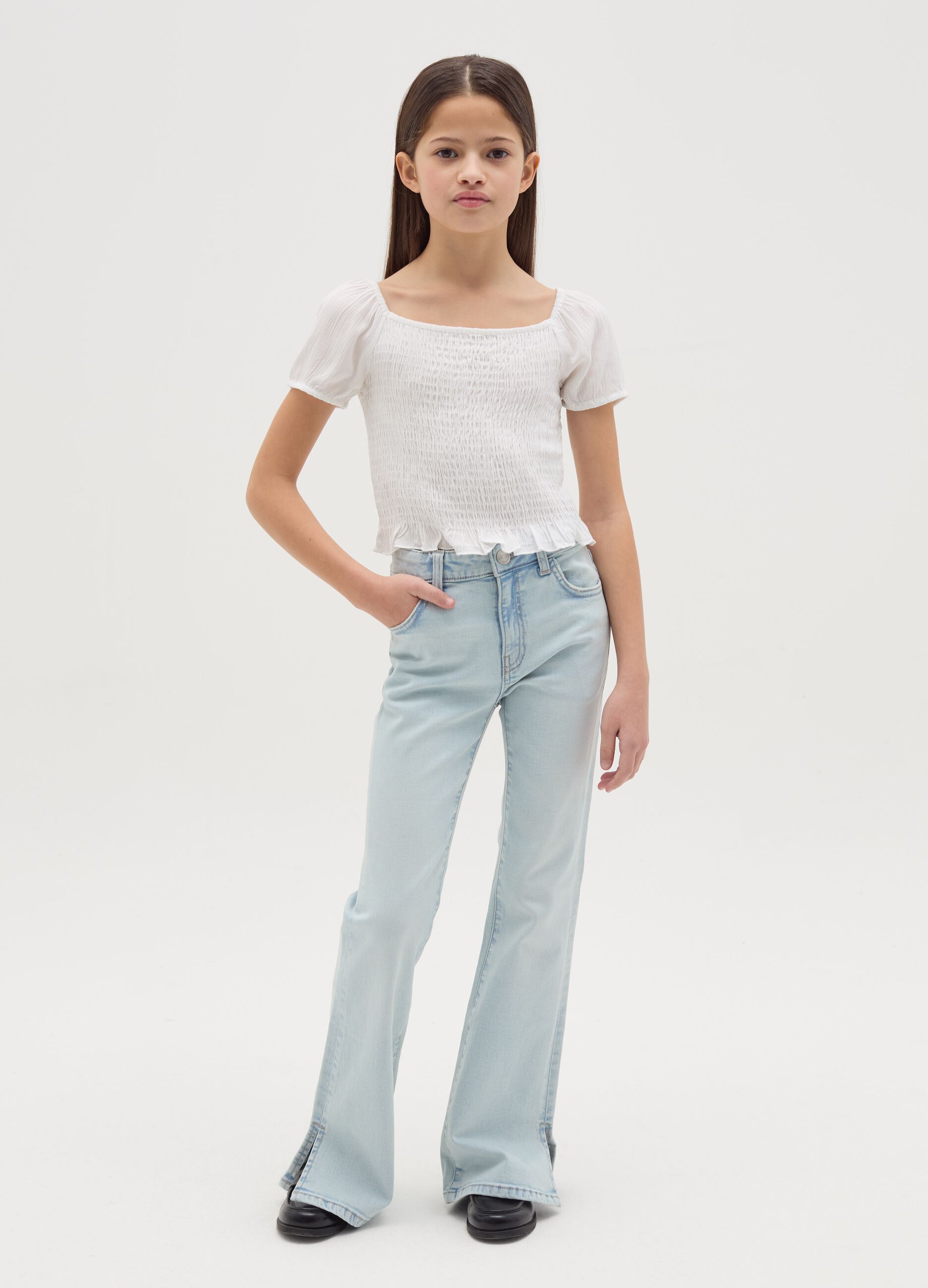 Jeans flare fit con scoloriture