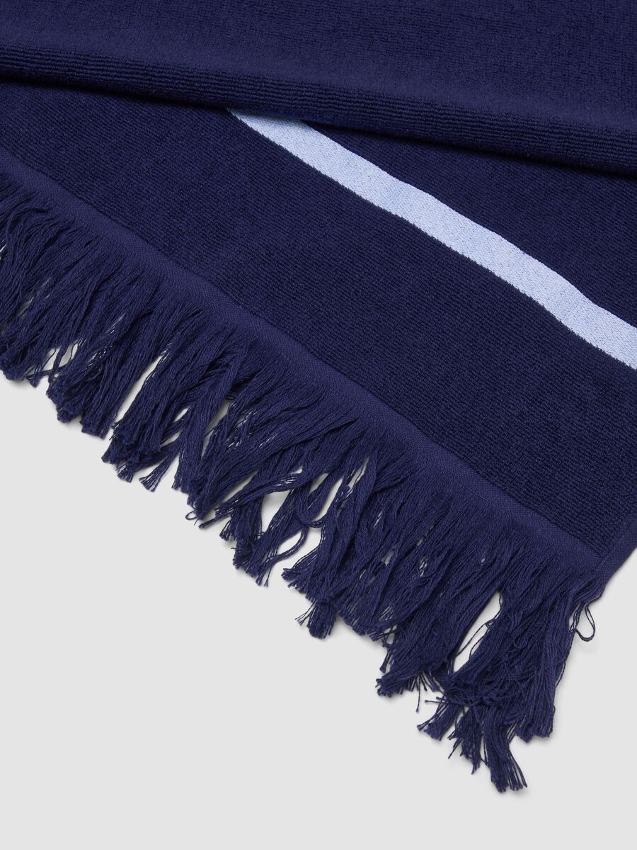 Telo mare blu in misto cotone con frange_2