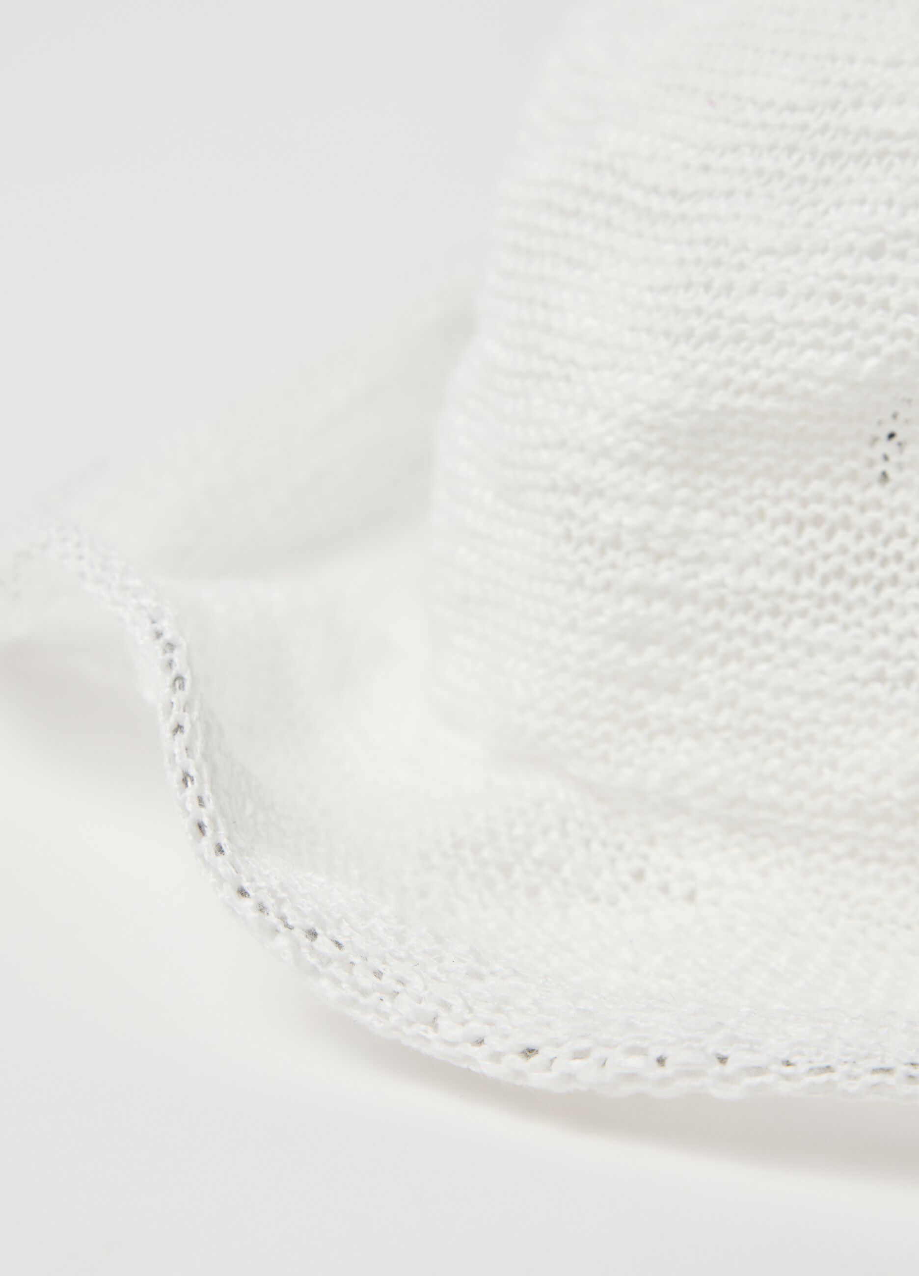 White cloche hat with knitted design
