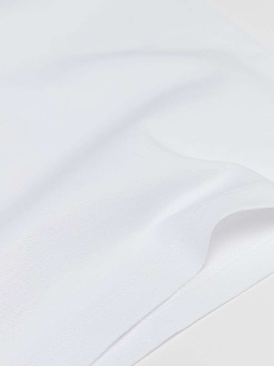 Three-pack racerback vests in organic cotton_3