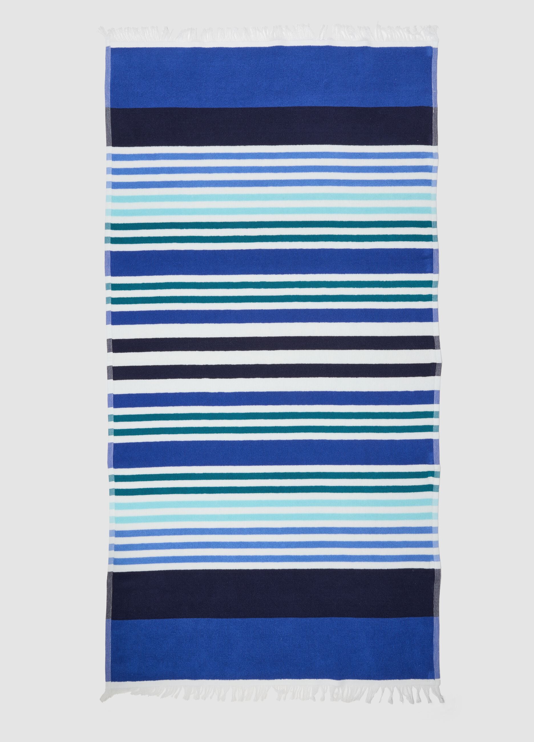 Telo mare blu in puro cotone a righe