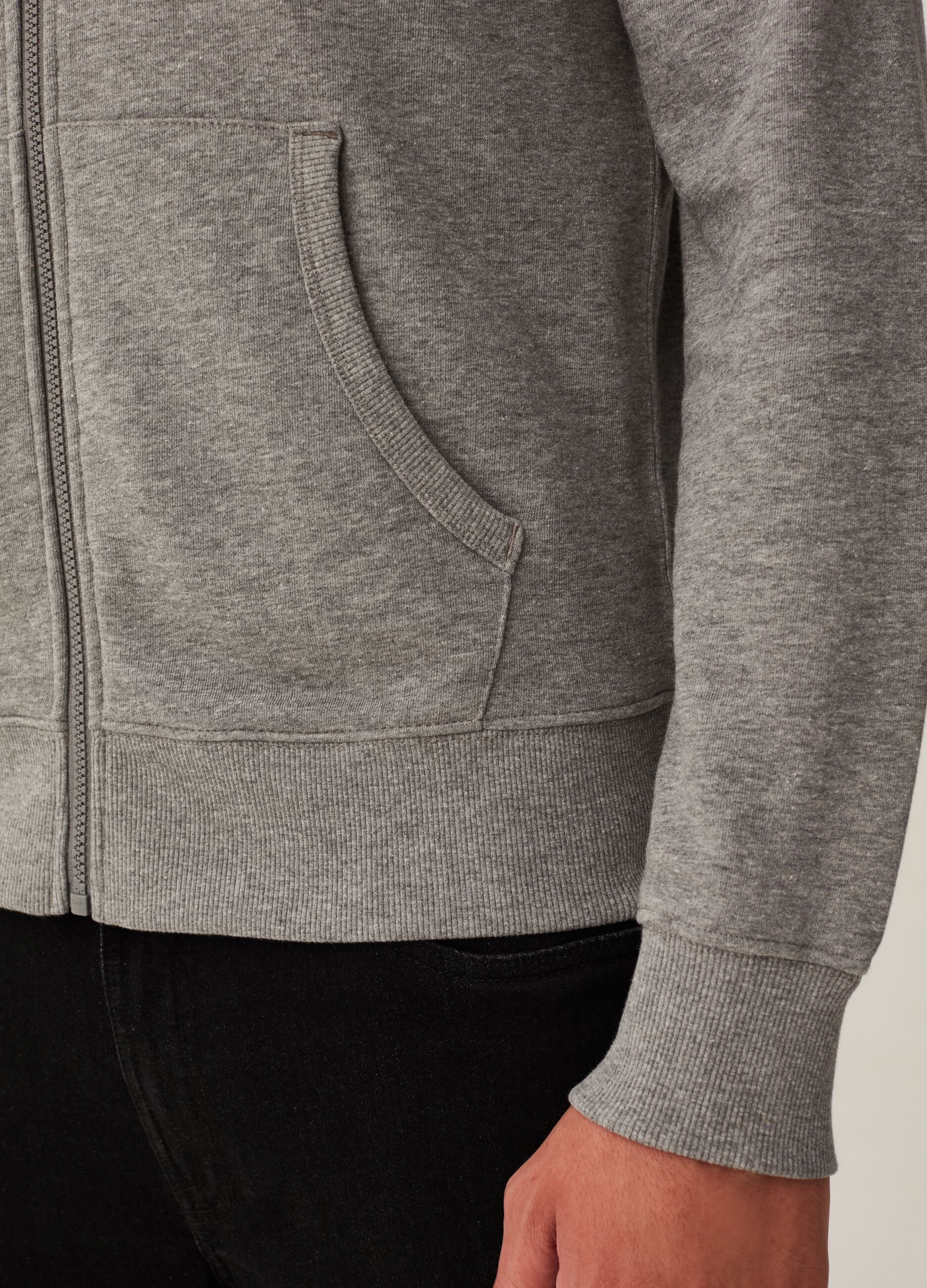 Full-zip in French Terry con cappuccio