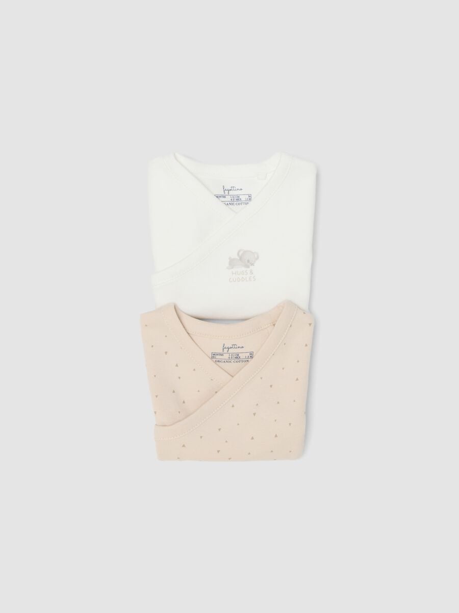 Bipack di body beige e bianco in cotone organico a maniche corte per bimbo_2