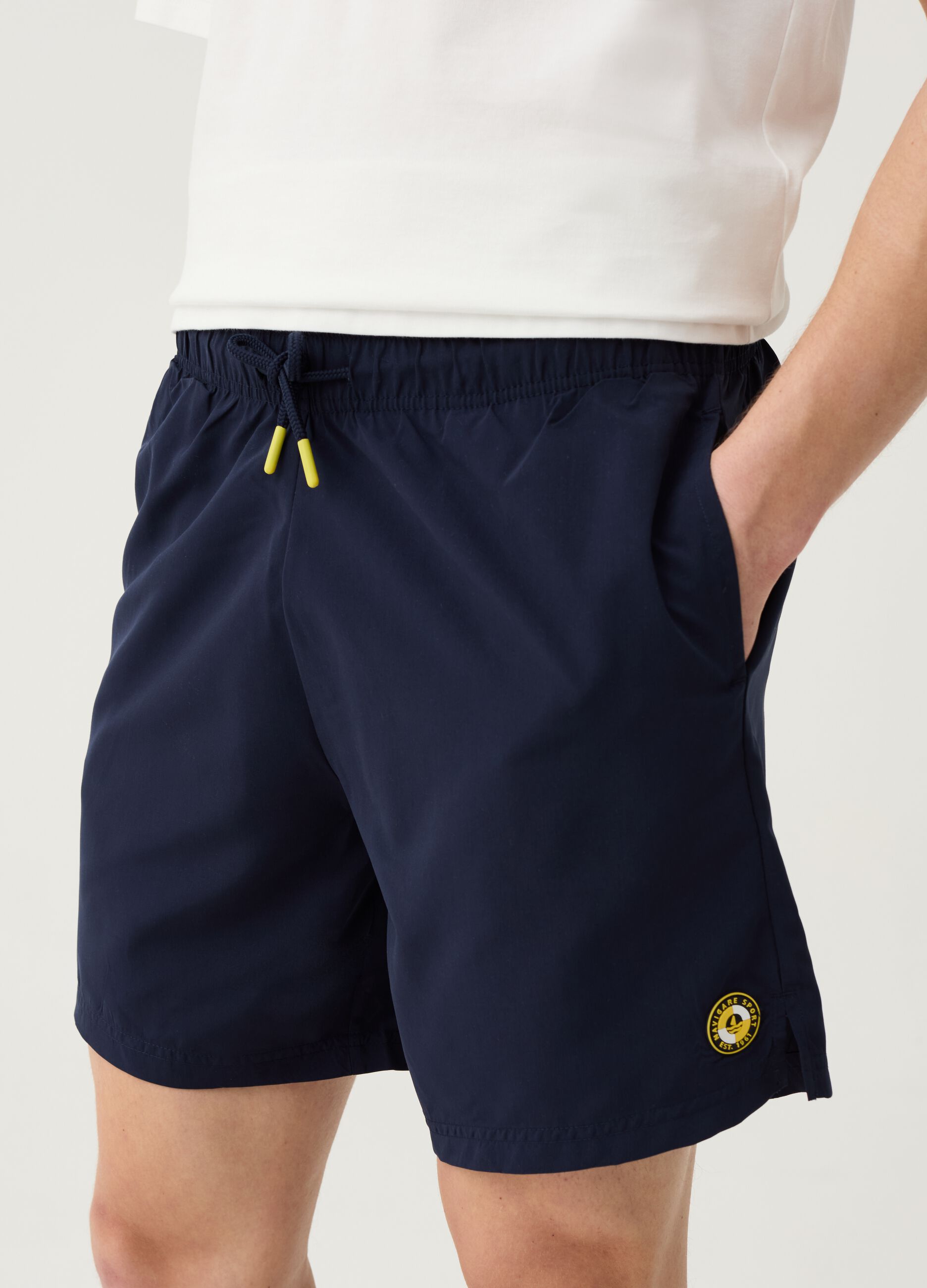 Bermuda joggers with Navigare Sport logo patch
